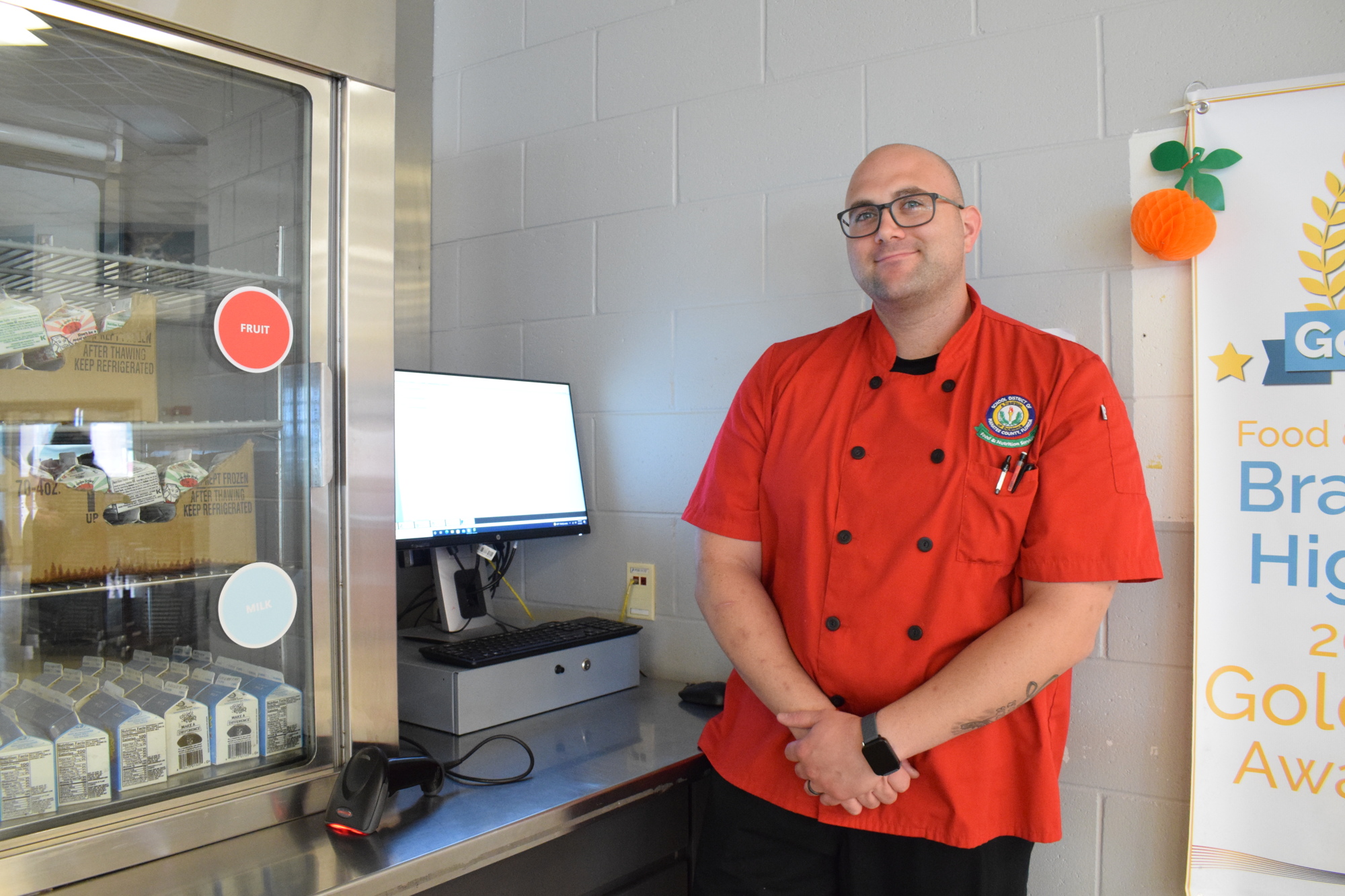 Seth Gwalthey, a cafeteria manager for the School District of Manatee County, loves working in schools rather than the restaurant industry.