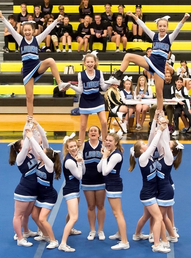The Foundation Academy competitive cheerleading team advanced to states after qualifying at the regional meet.