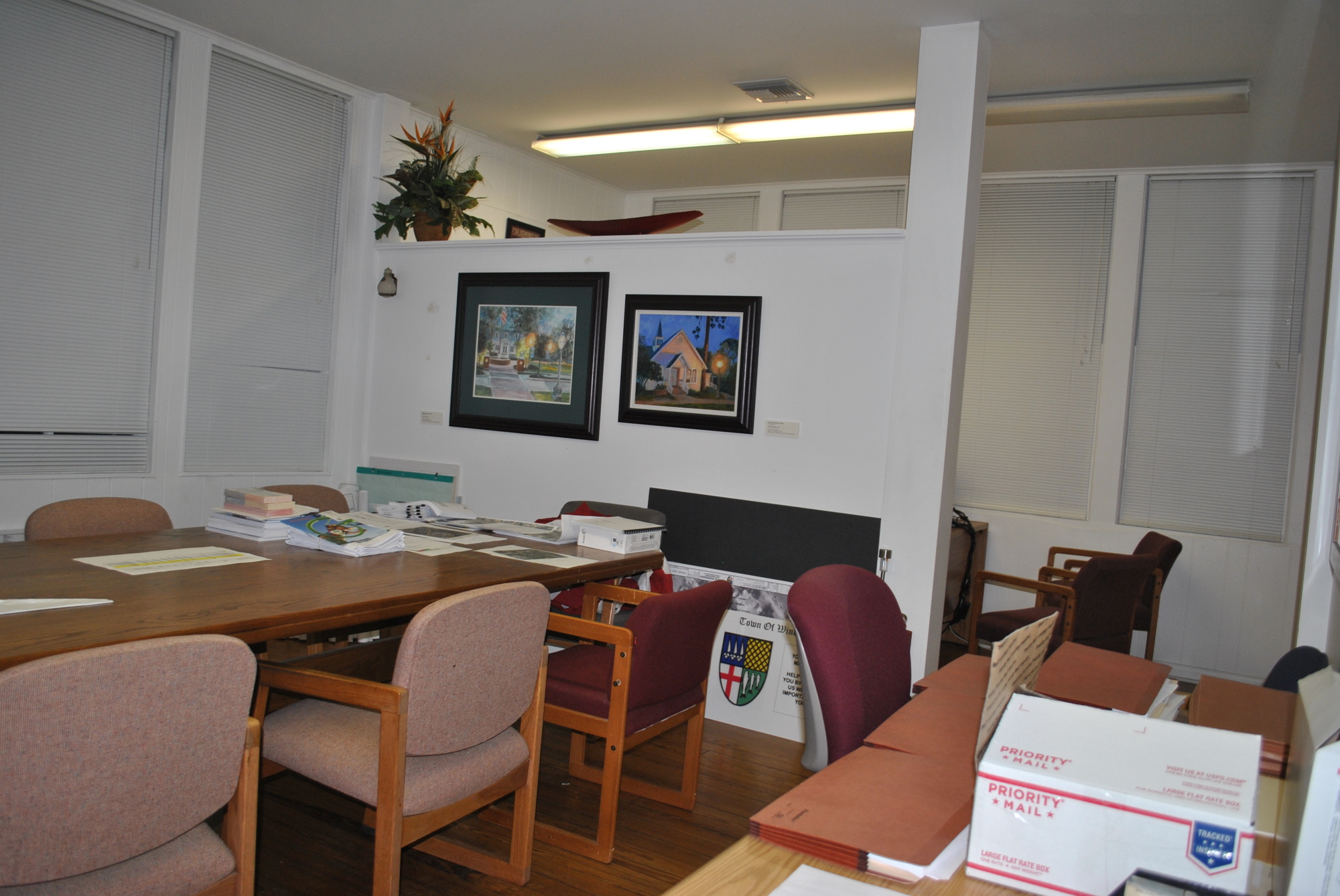 Even the town manager’s office is not separated from a conference room by more than this partial wall.