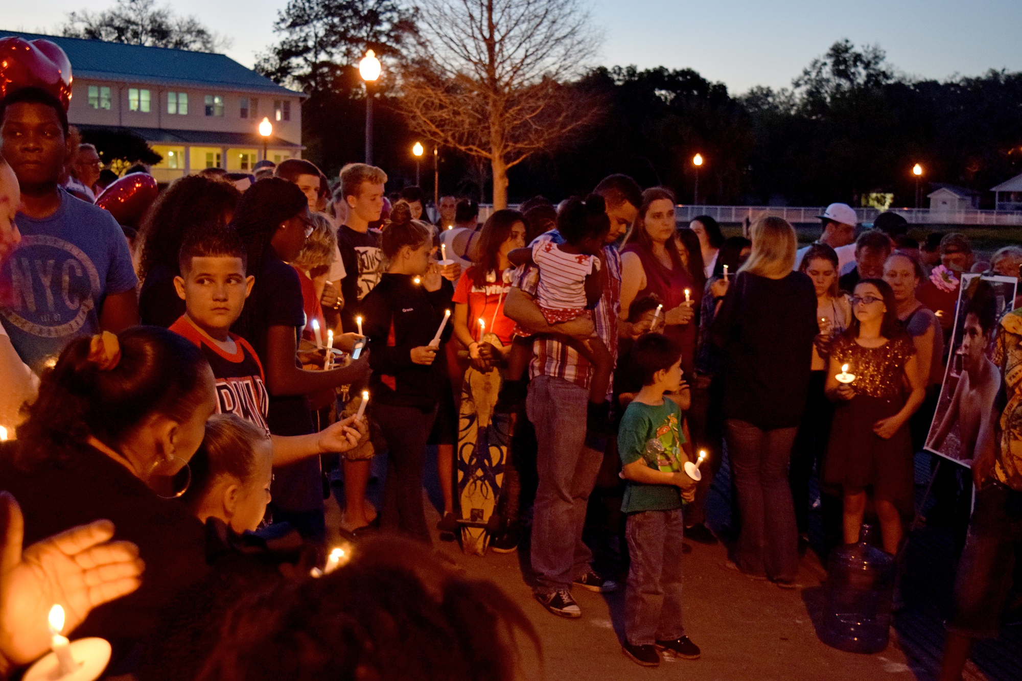 Attendees held their lit candles and sang “Amazing Grace” in memory of Antwan.
