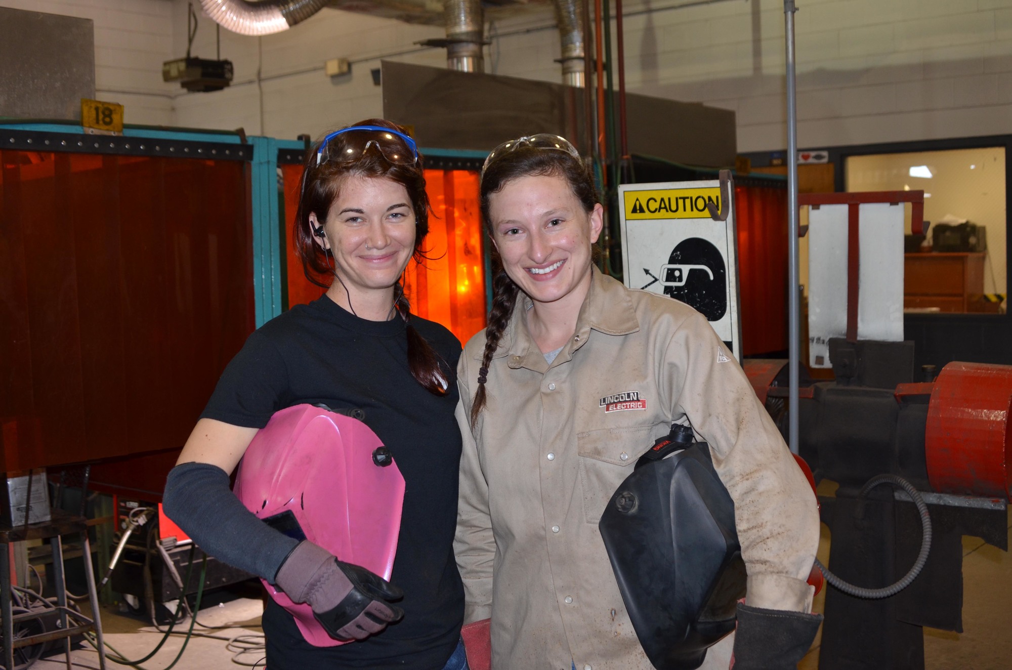 Madeline Slater, left, and Emily Wolcott are the only two females in the welding program at Westside College, in Winter Garden.