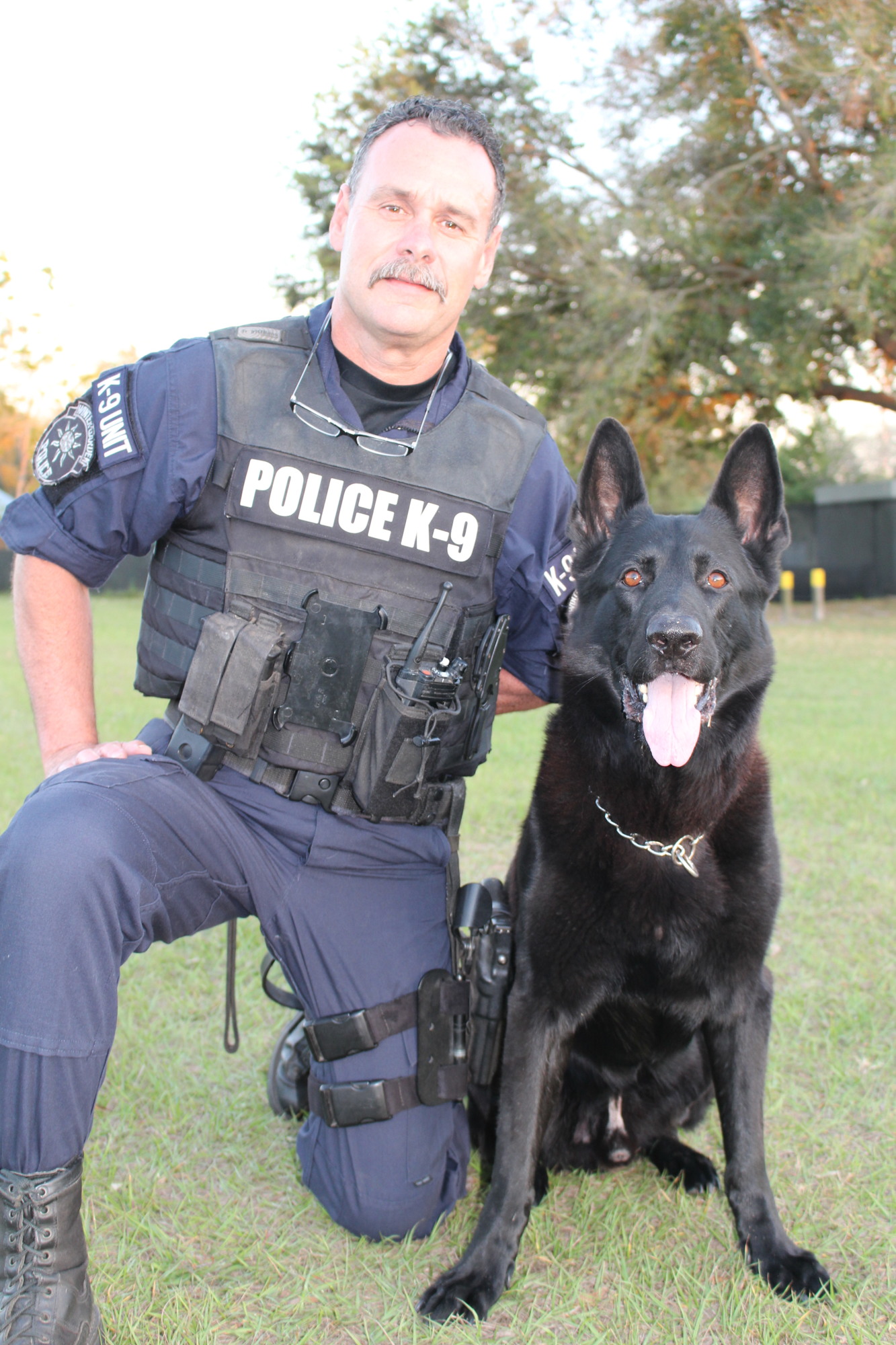 W.G. police officer Jeff Doyle poses with 7-year-old K-9 Kimber, who was imported from the Czech Republic. “Kimber is kind of a little practical joker. Everything in life is fun for him.