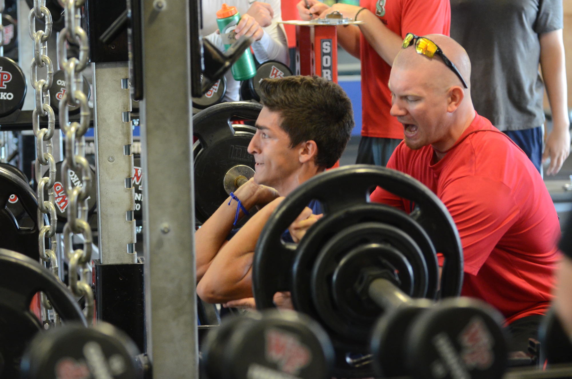 Gibert works hard to create a culture of competition in the weight room on campus.