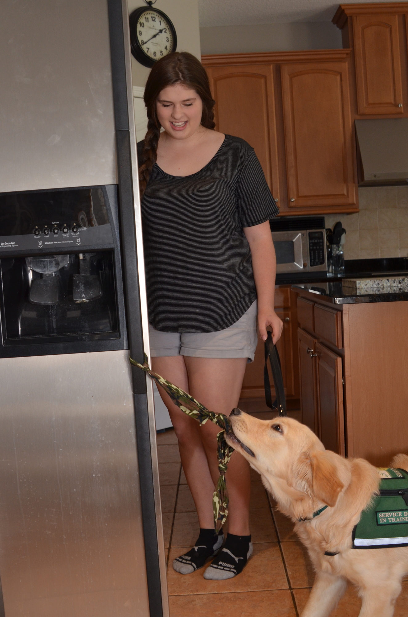 Ashton Kaatz, 15, is training 6-month-old Duchess to help someone who needs assistance through New Horizons Service Dogs.