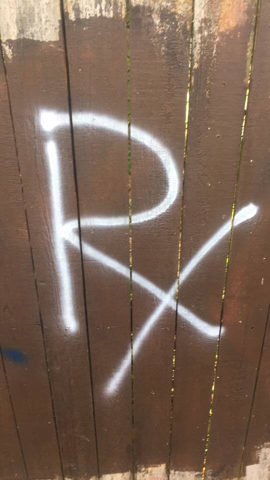 Ocoee police are searching for the graffiti artist who tagged a fence near Spring Lake Elementary with this symbol nearly 20 times. Courtesy Ocoee Police Department.