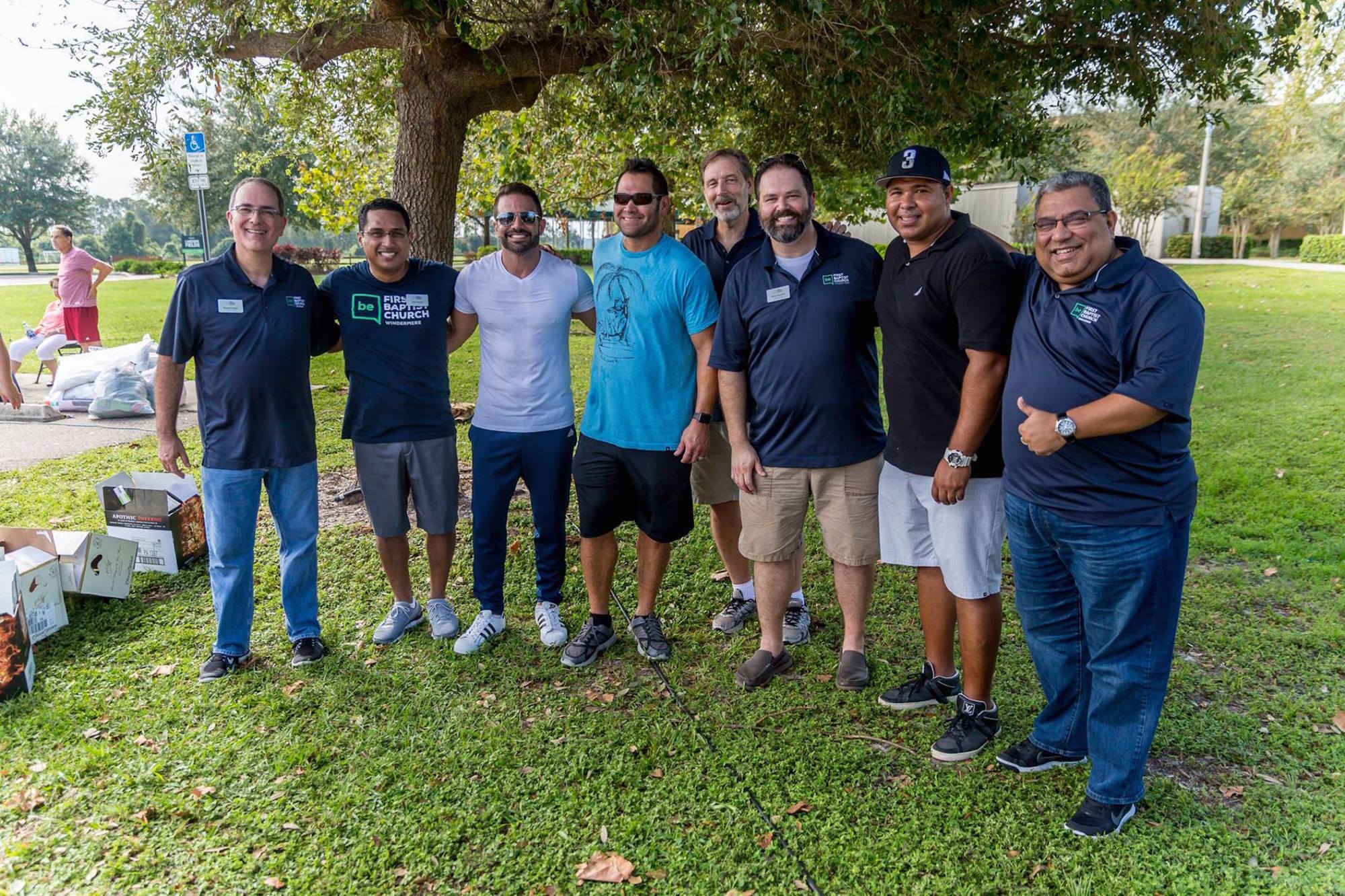 First Baptist Church Windermere pastors and church members pose with professional baseball players who made an appearance at the church’s donation drive for supplies for Puerto Rico.