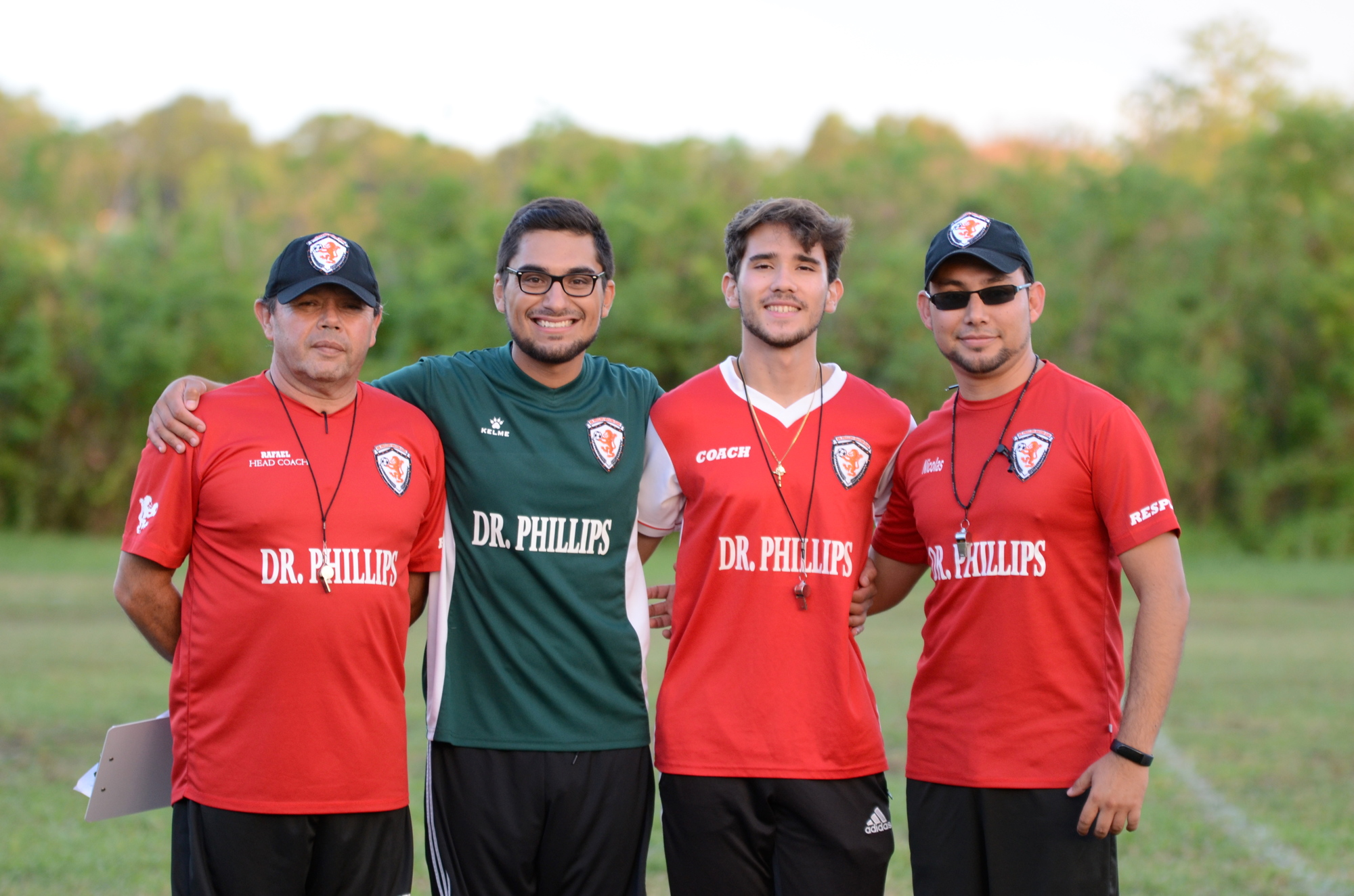 Dr. Phillips Soccer Club coaches Rafael Navarro, left, Eduardo Martinez, Gonzalo Sepulveda and Nicolas Navarro all work to create a family-atmosphere within the club.