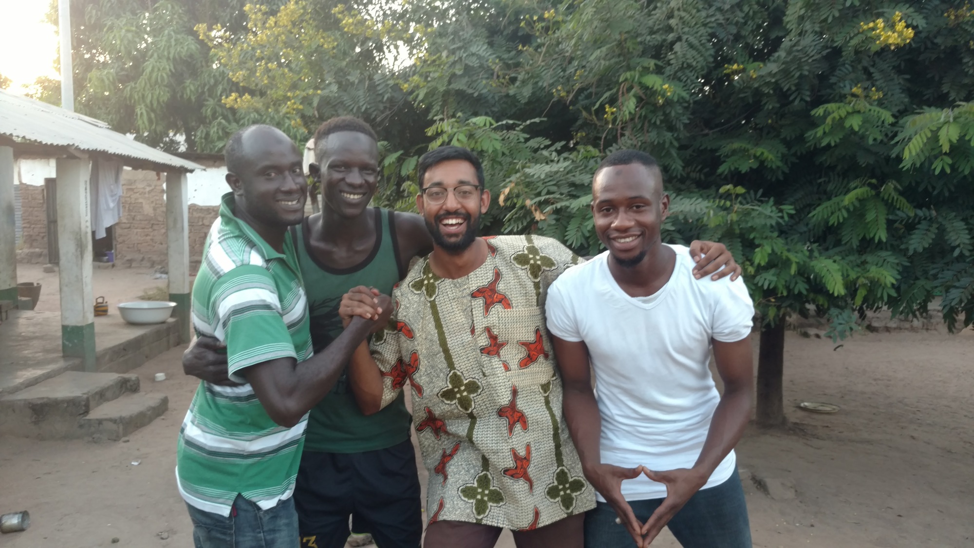 West Orange High graduate Rehan Khan, center, loves having a positive impact on the lives of people in The Gambia.
