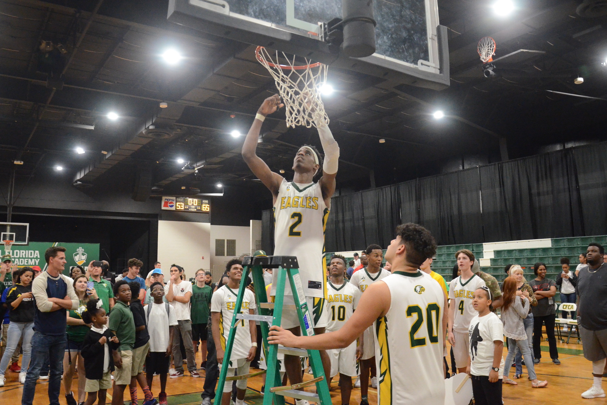 The CFCA Eagles cut down the nets at their home gym after winning a trip to the FHSAA Final Four in Lakeland.