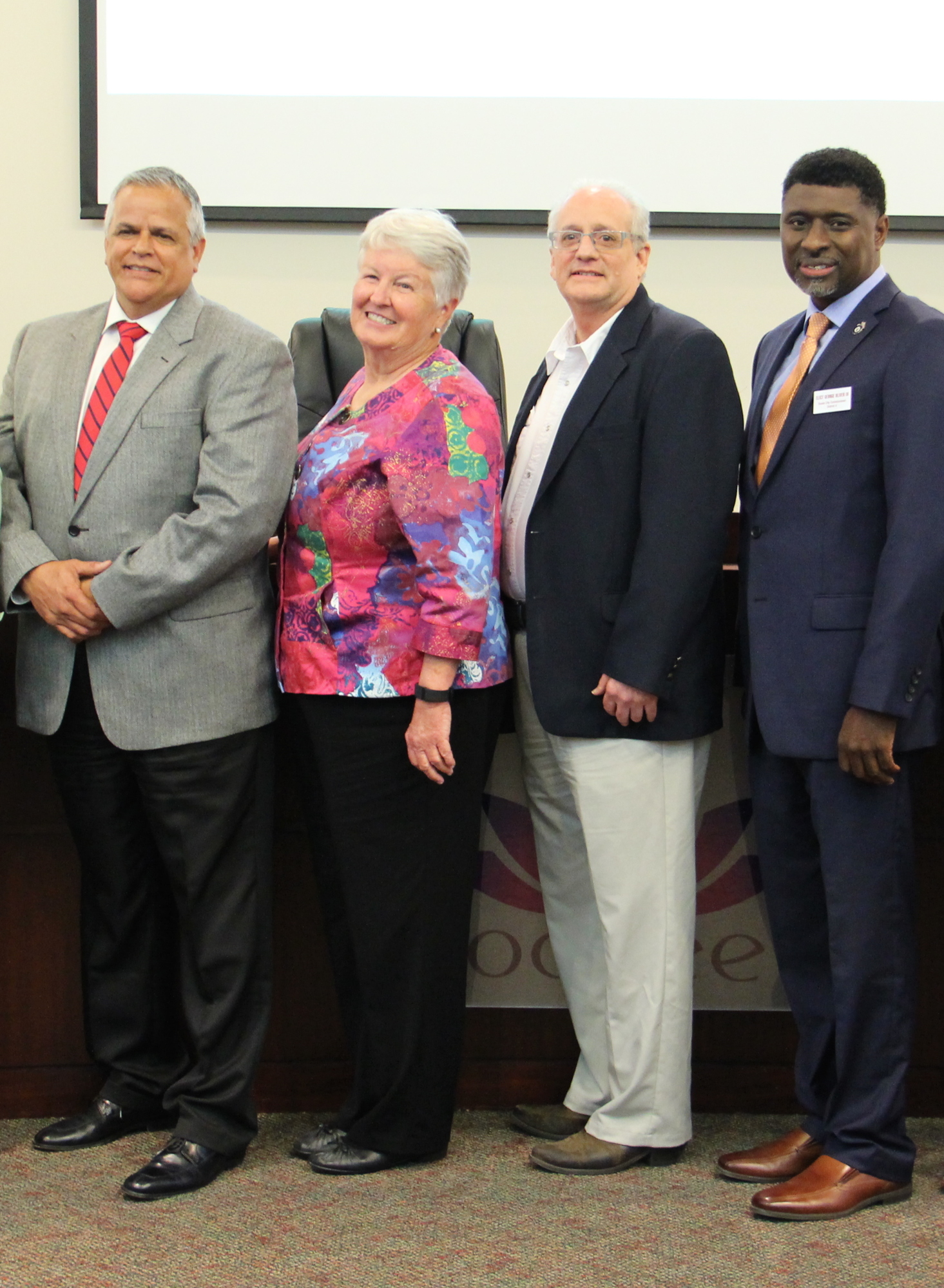 Left to right, District 2 challenger Robert Rivera, District 2 incumbent Rosemary Wilsen, District 4 incumbent Joel F. Keller and District 4 challenger George Oliver III posed for a group photo.