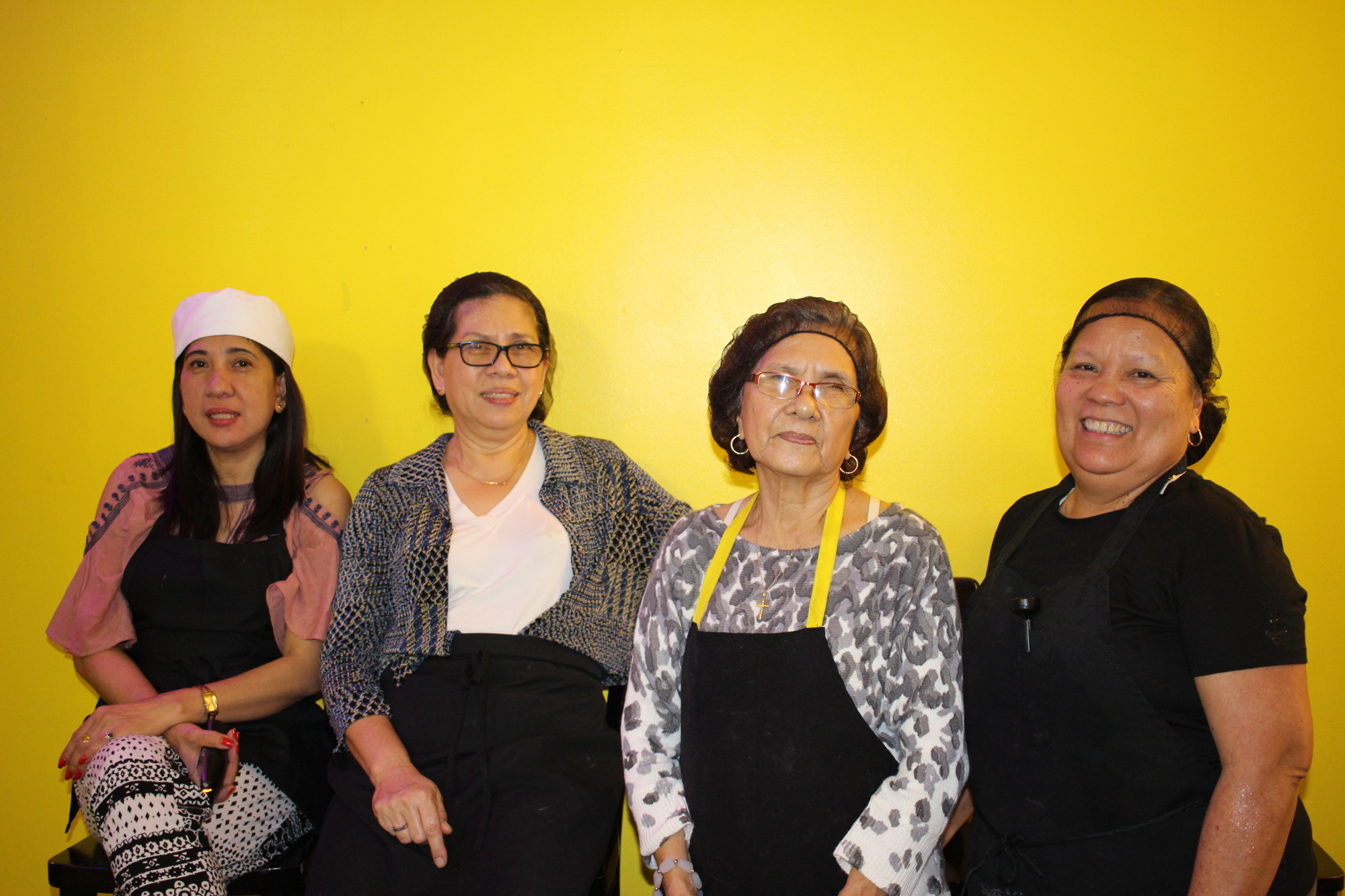 Left to right, Marilou Arias, Linda Noble, Dominga Mangundayao and Maria Mulligan cook the meals and take care of the customers at Inay’s Kitchen.
