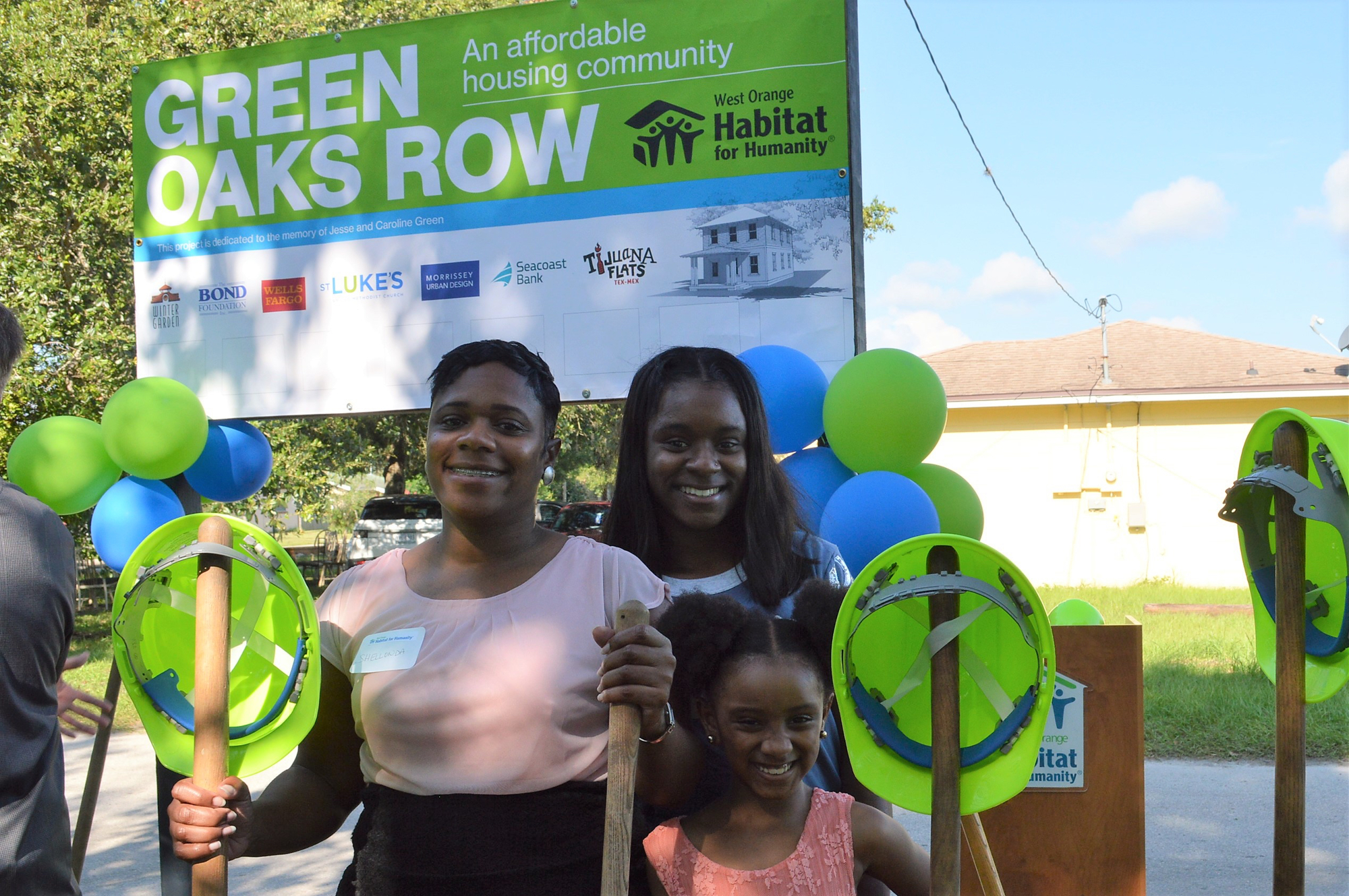 Shellonda Hill, pictured here with her two daughters, is a recipient of one of the Green Oaks Row homes in Winter Garden.