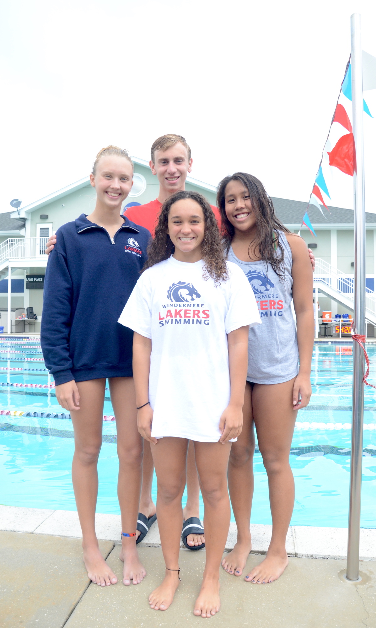 WLA swimmers Lyndsey Huizenga, left, Benjamin Mack-Jackson, Elizabeth Cottle and Grace Khunduang are college prospects.