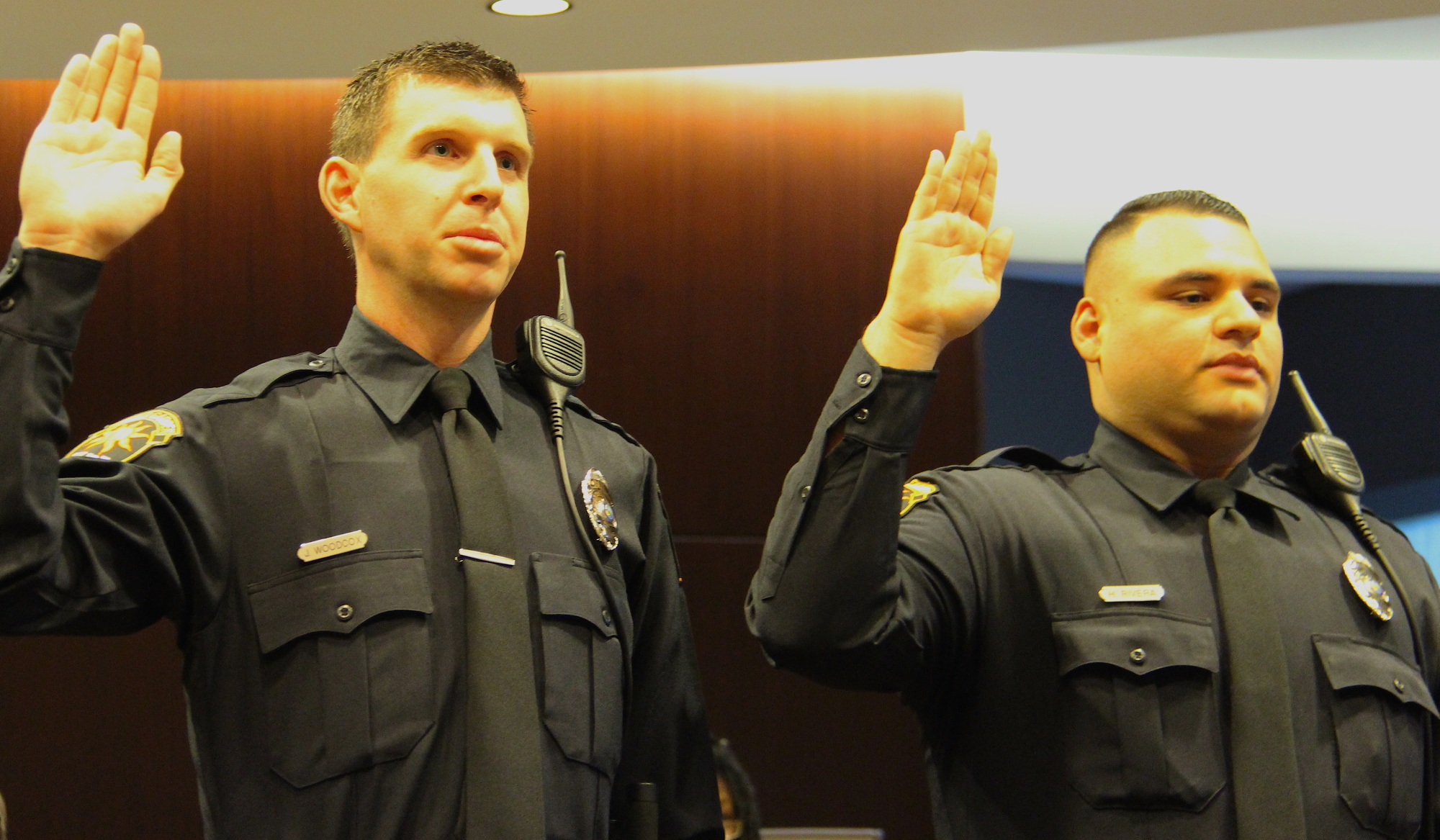 New Winter Garden Police Officers Jonathan Woodcox, left, and Heriberto Rivera were sworn in at the Winter Garden City Commission meeting on April 12.