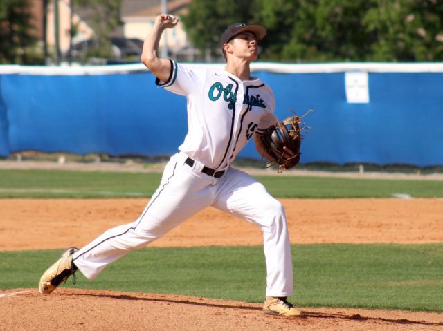 Jeslyn Whitehead earned the win on the mound for Olympia. Photo by Nate Marrero.