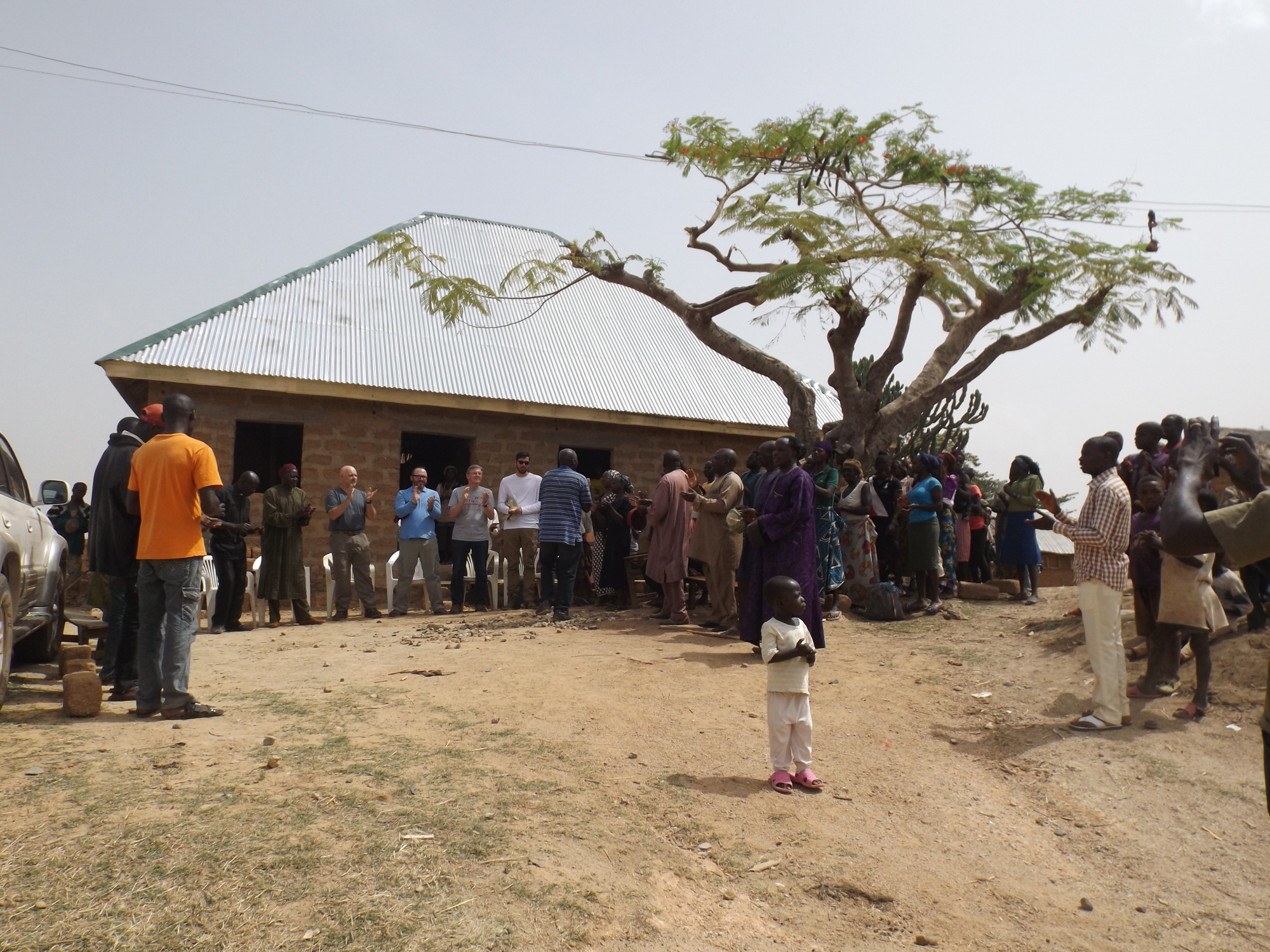  The entire village showed up for the dedication of the pastor’s new home.