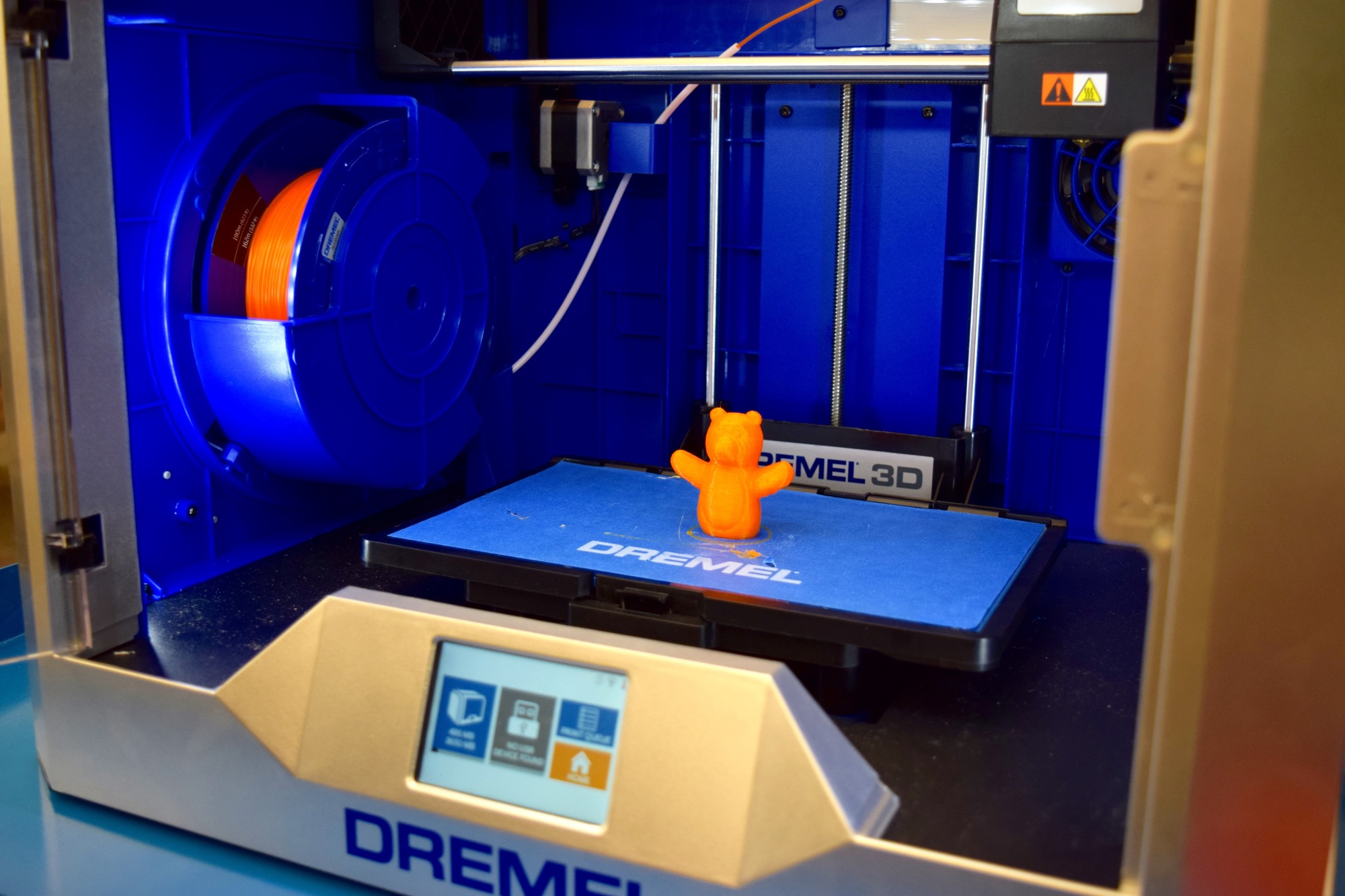 One of the sample objects the Dremel printer produced is a bear-shaped finger puppet.