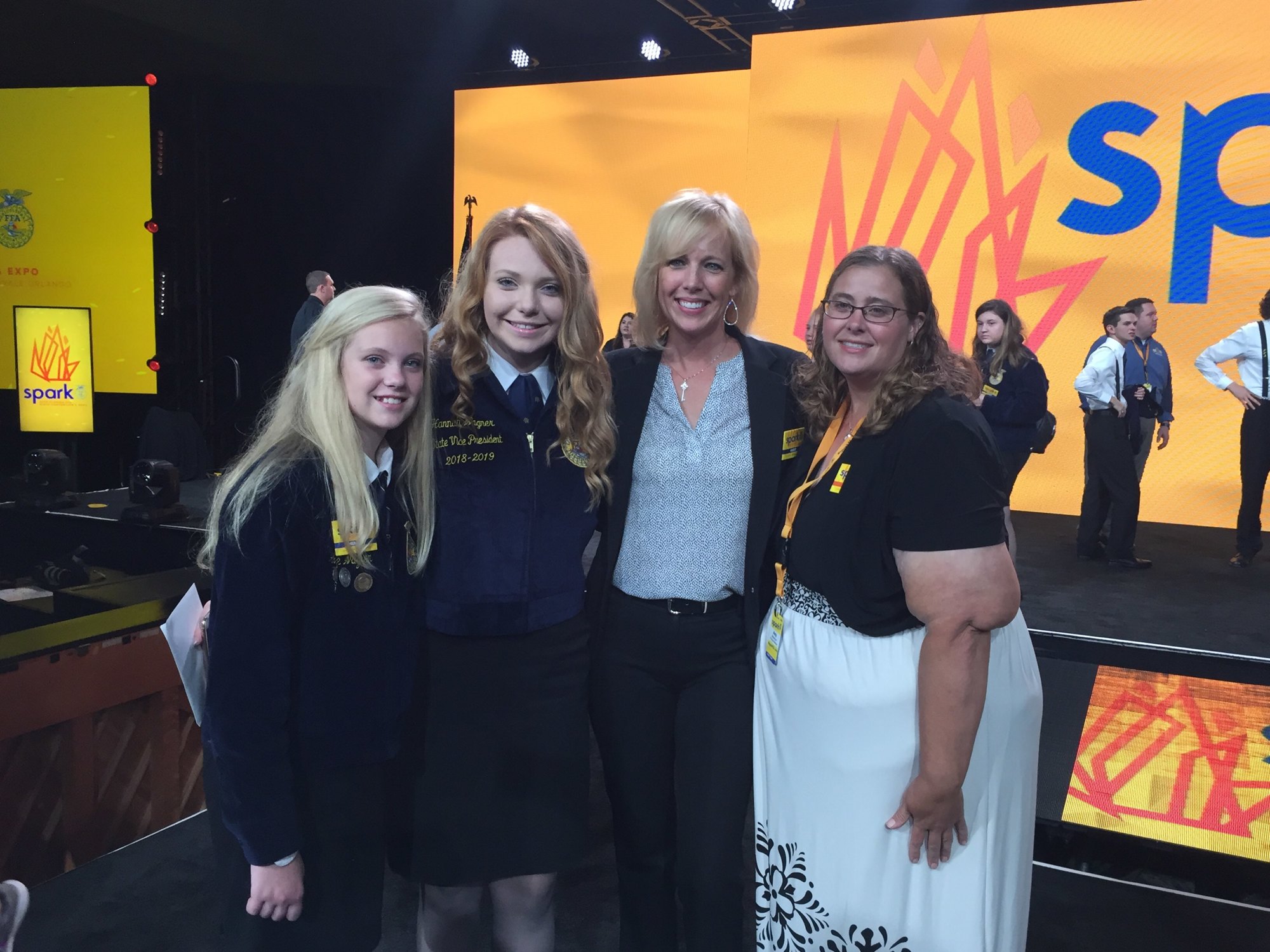 Hannah Wagner, second from left, is congratulated by her sister, Hope Wagner, left; mother, Sherri Wagner; and Ocoee High FFA advisor Amy Anderson.