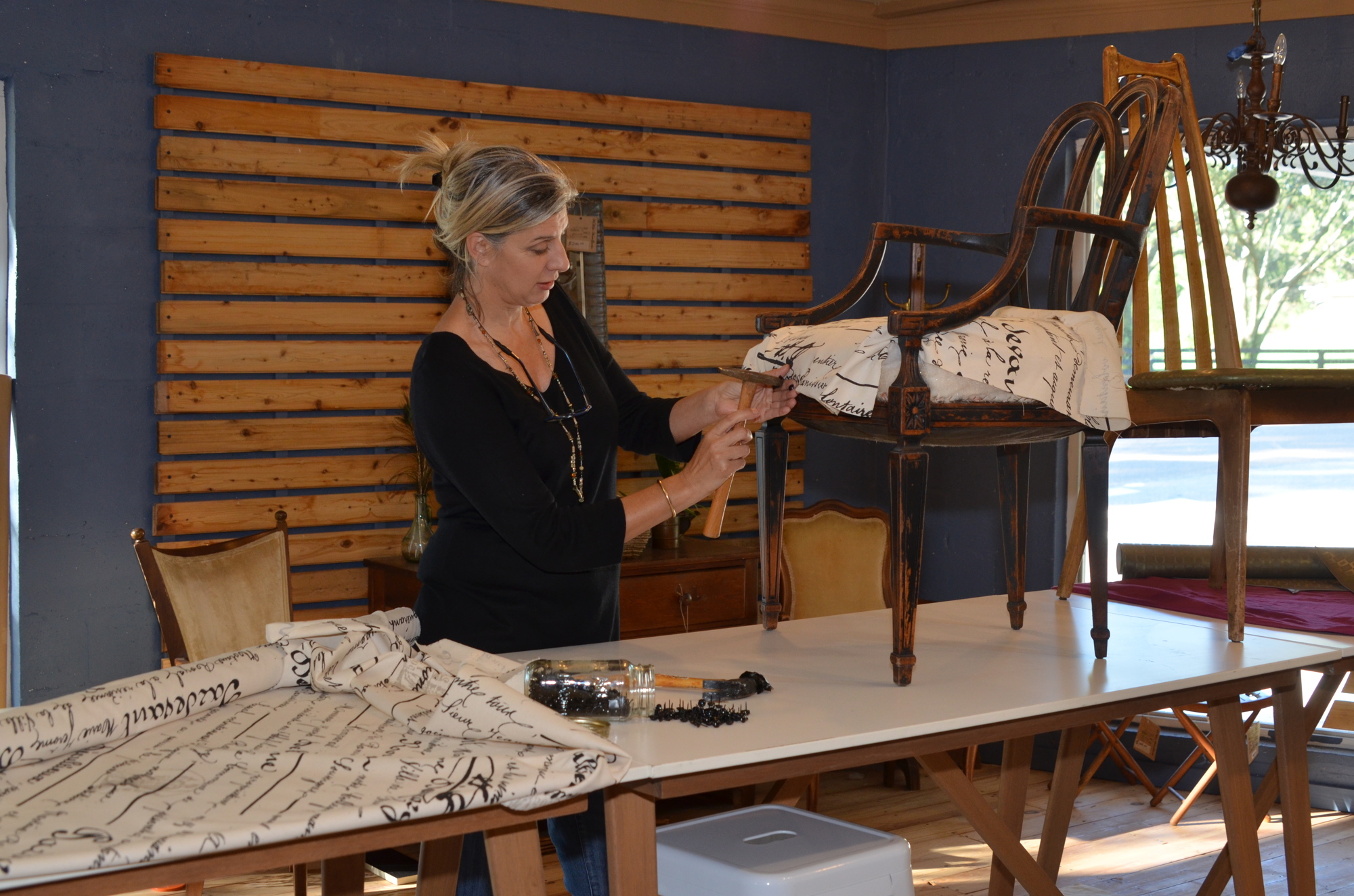 Tina LaVallee takes old chairs and makes them new again