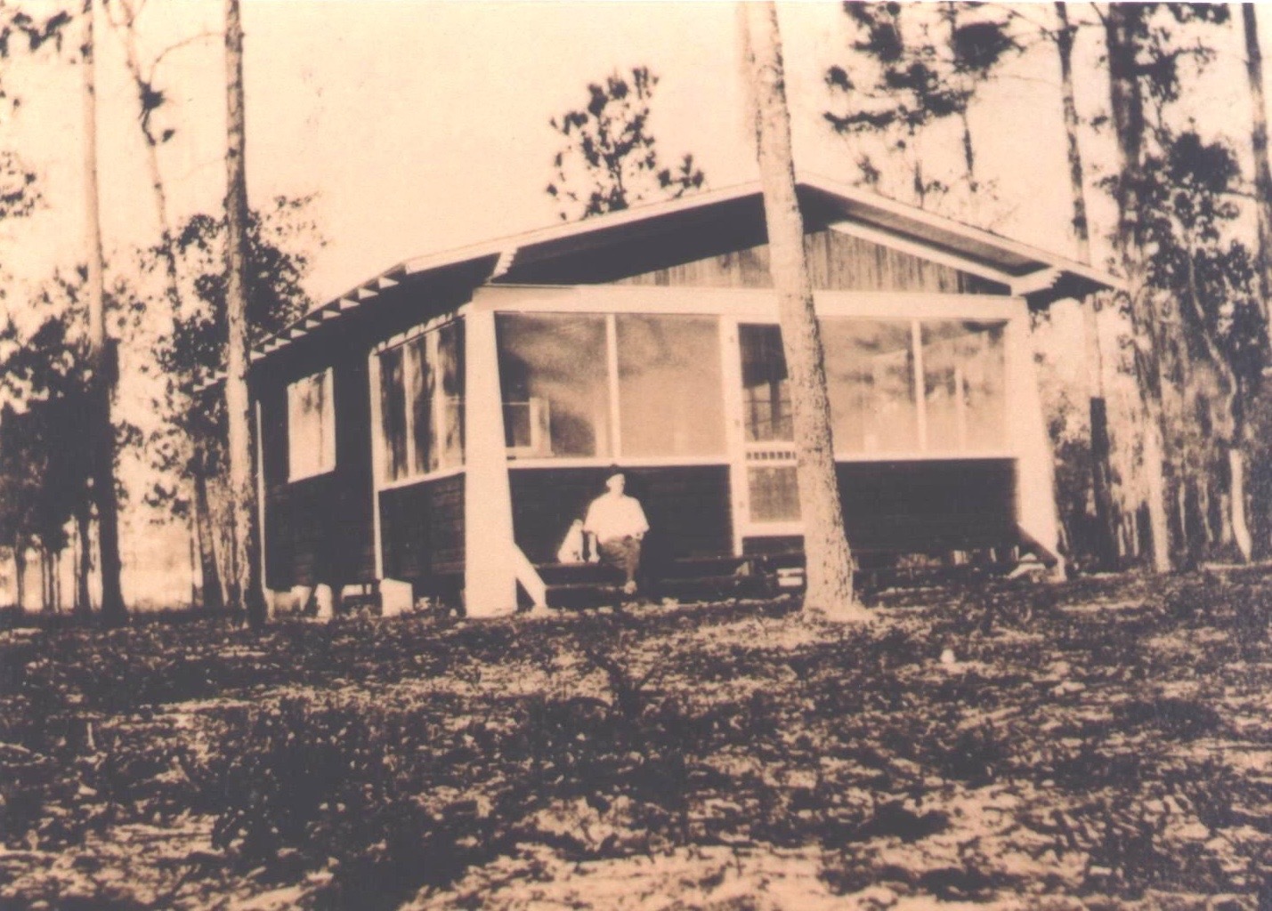 This is the oldest photo of the building. It depicts Cal Palmer in front of his office in 1912.
