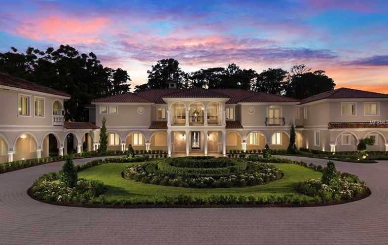 One of the multimillion-dollar homes listed for sale in the Chaine Du Lac community. This 10-bedroom estate home priced at $16.6 million.