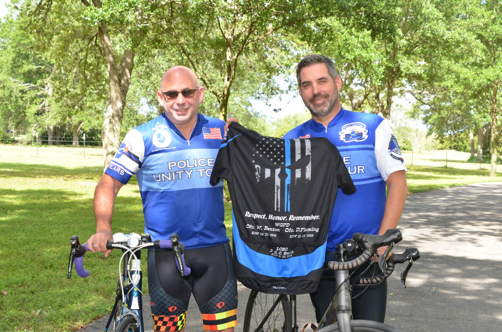 Andrew Raphael, left, and Joe Cassidy are two of the eight members of the Chapter VIII local team raising funds and riding their bikes 254 miles for the Police Unity Tour next month.