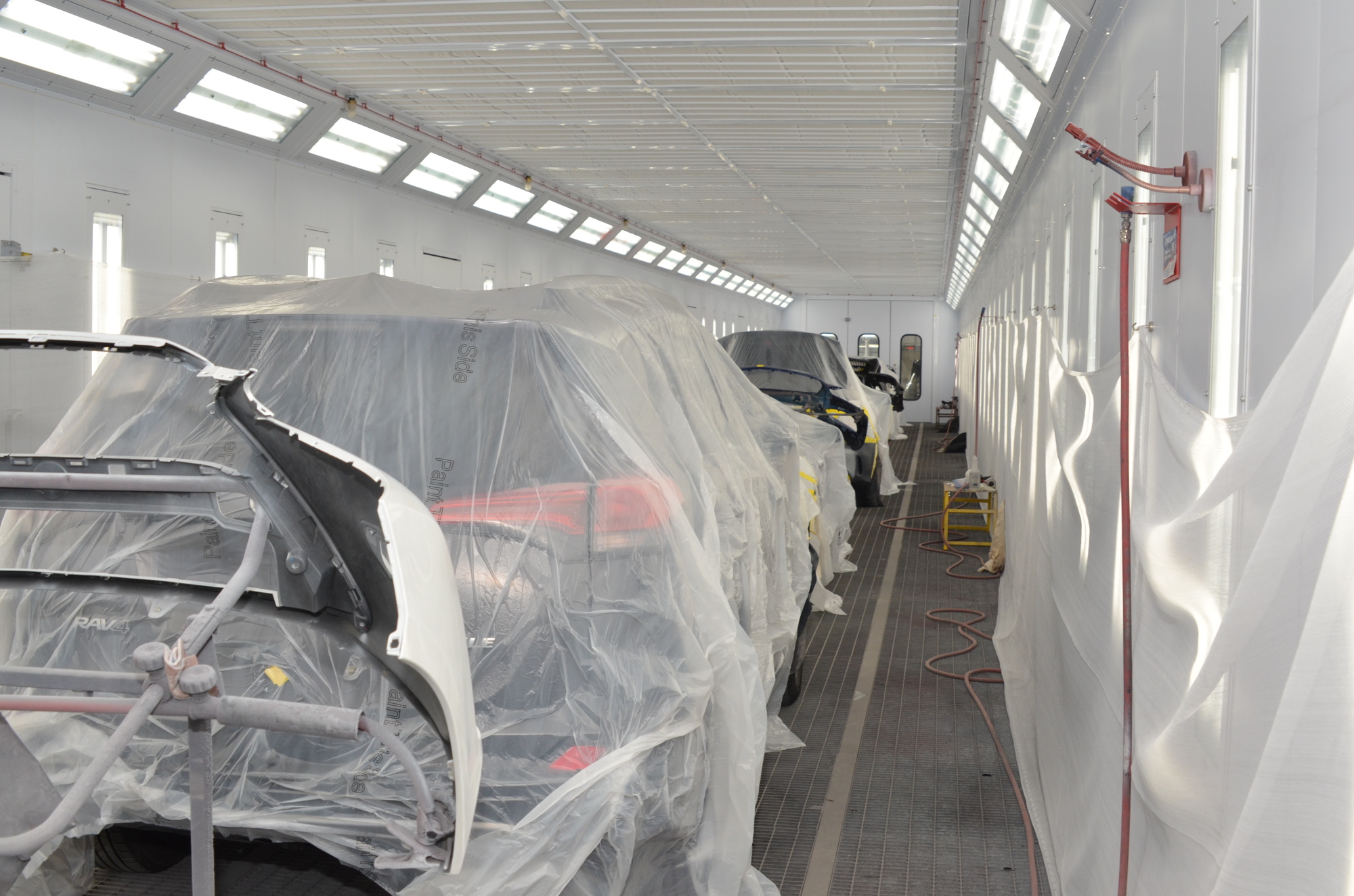 Two 140-foot-long paint booths can accommodate seven vehicles and paint seven different colors at one time.