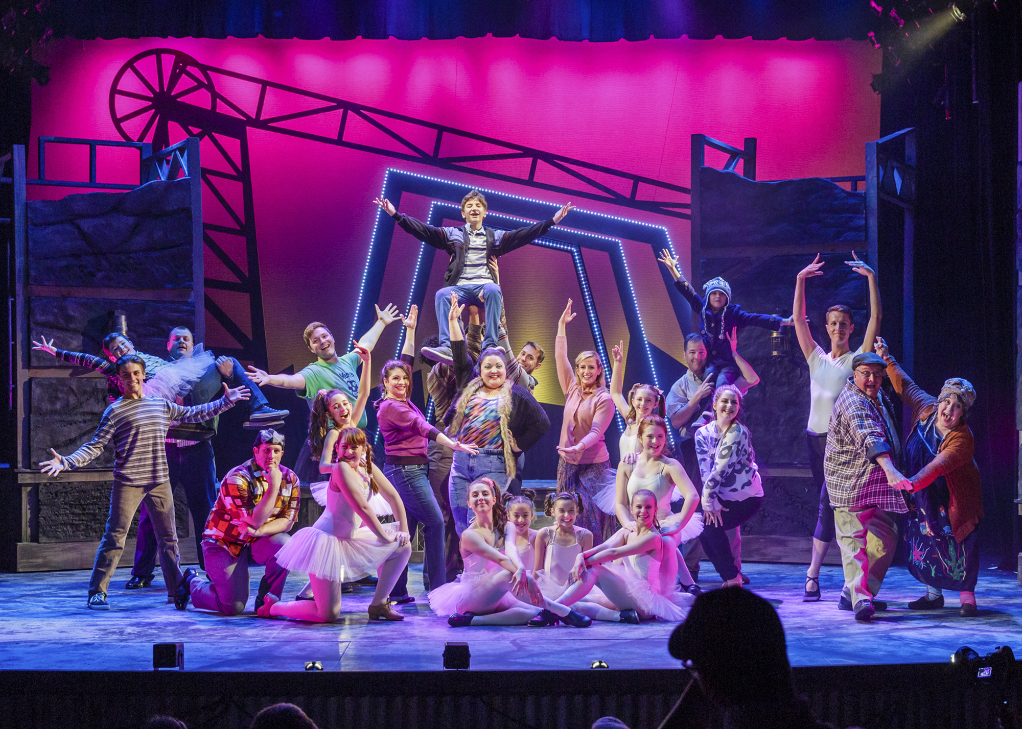 Cast members of “Billy Elliot: The Musical” strike a pose after a dance number.