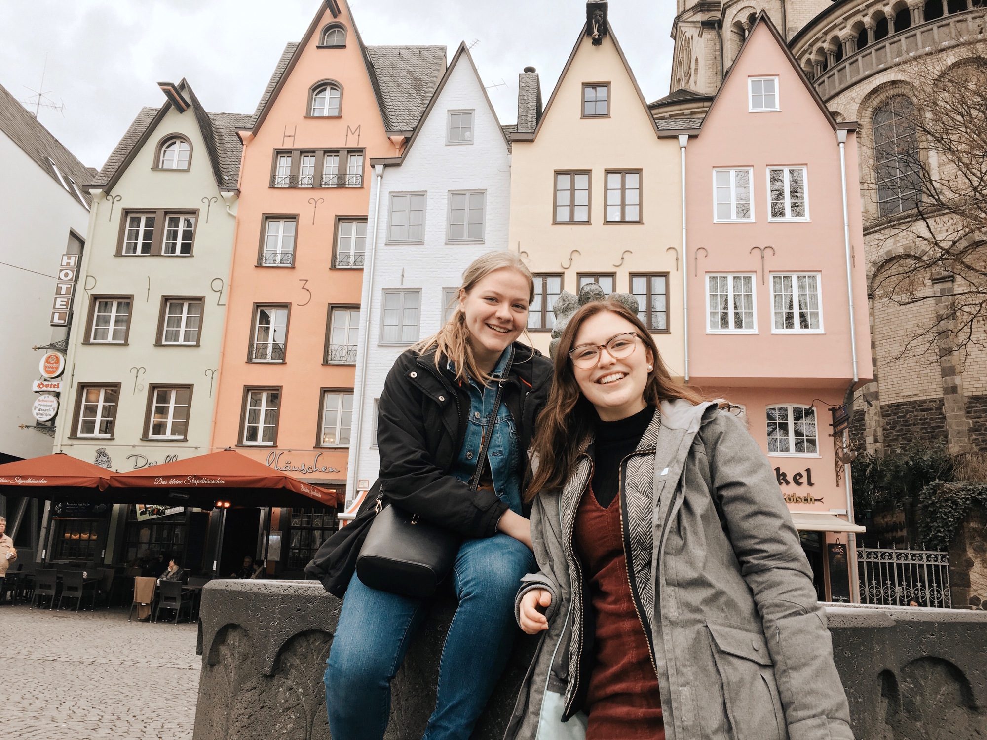 Marli Watson, left, and Julia Oborna, another CBYX American exchange student, attended a concert in Cologne. The Fischmarkt stands behind them.