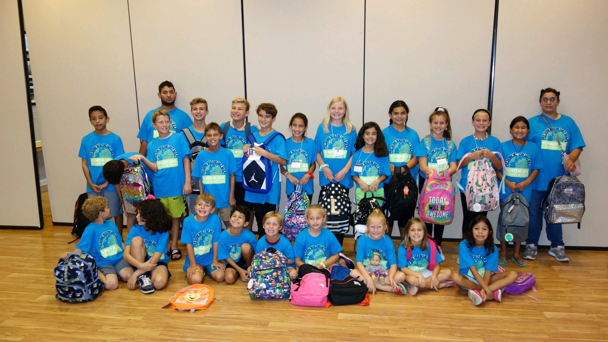More than 20 children in the Kind Kids Foundation gathered on Thursday, Aug. 1, to pack backpacks with school supplies for children at SunRidge Elementary.
