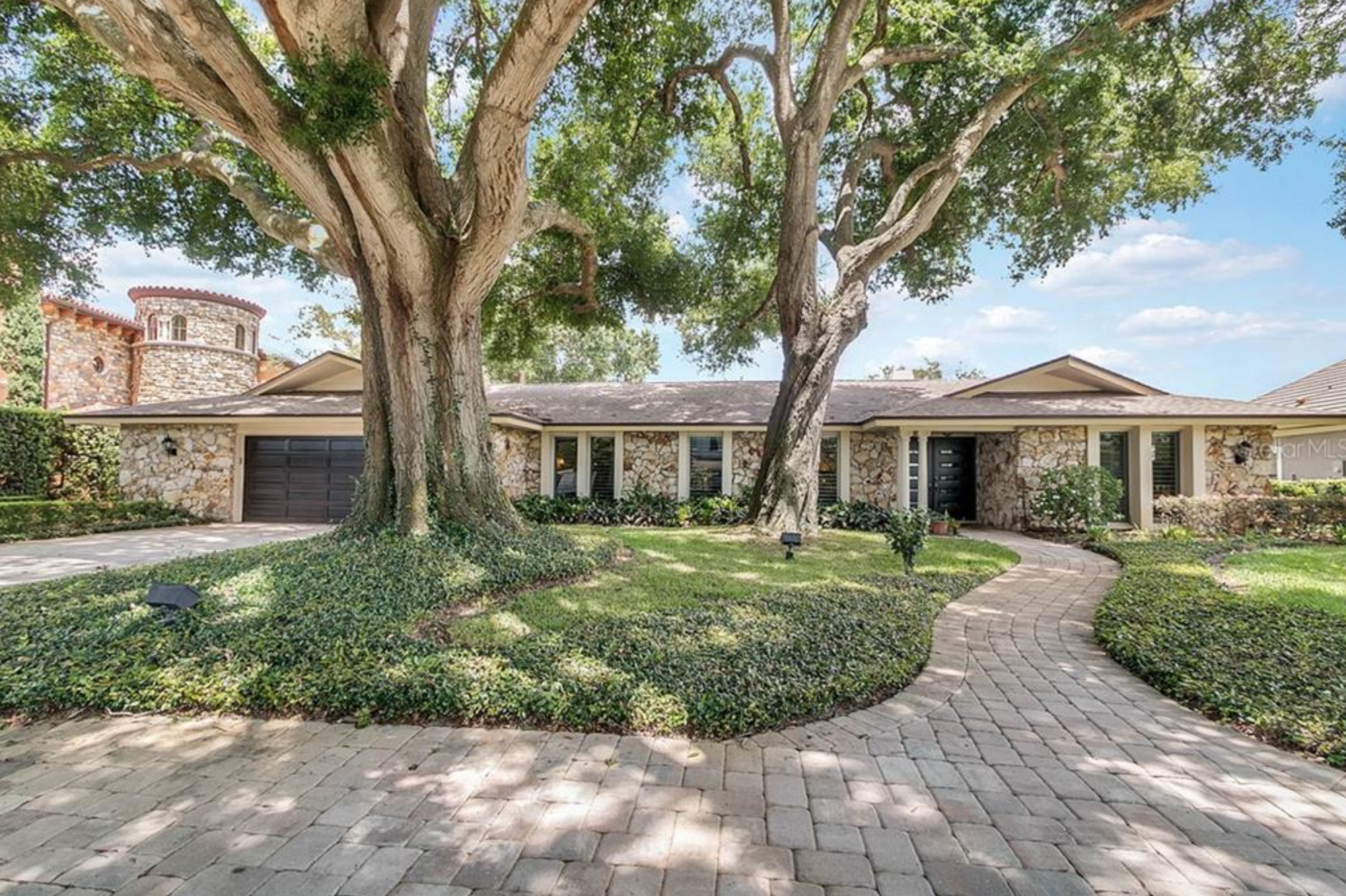 The home at 6123 Tarawood Drive, Orlando, 32819, sold Sept. 5, for $1.1 million. This home features Brazilian cherry wood flooring and an open-concept kitchen with Busby cabinets, two refrigerators and a sit-down, high-top island. movoto.com.