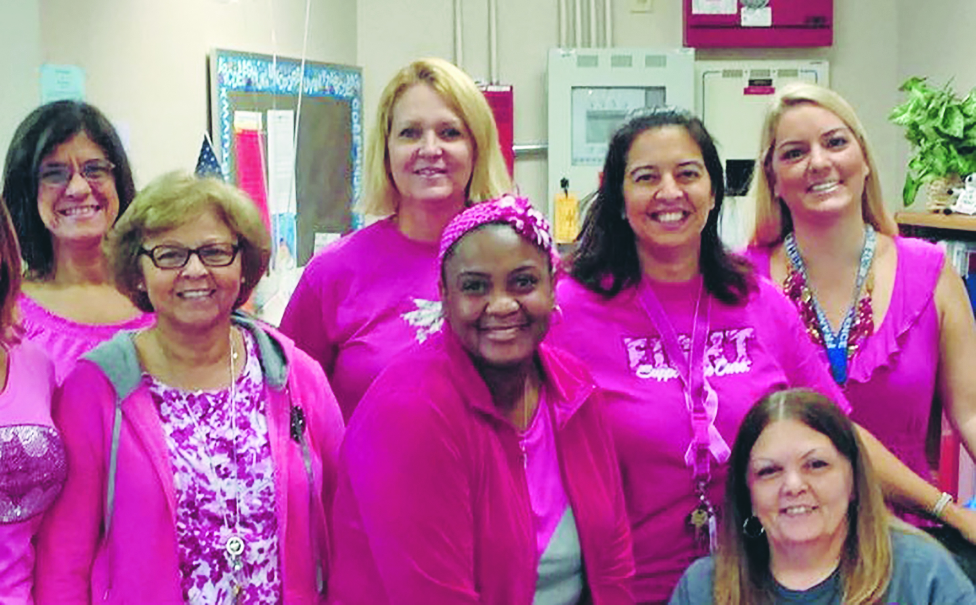 Many of Gail Kiehm’s colleagues at Frangus Elementary participated in Pinktober: front, Hilda Oliveras, nurse Rhonda Madison and Kiehm; back, Ann Cherolini, Connie Ryczek, Liana Hulcher and Michelle Friedman.