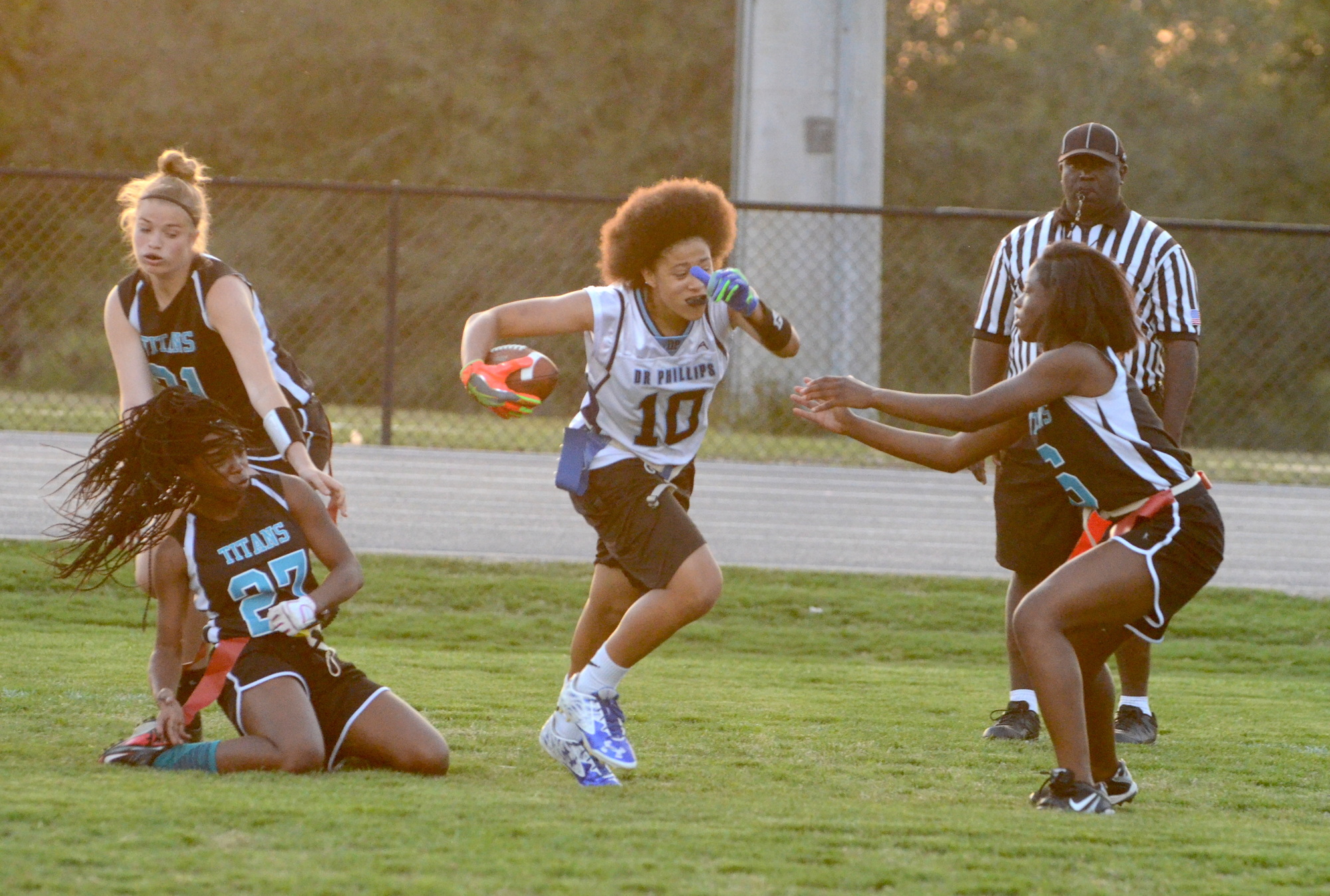 Tiffany Tolbert eludes defenders during a game against Olympia.