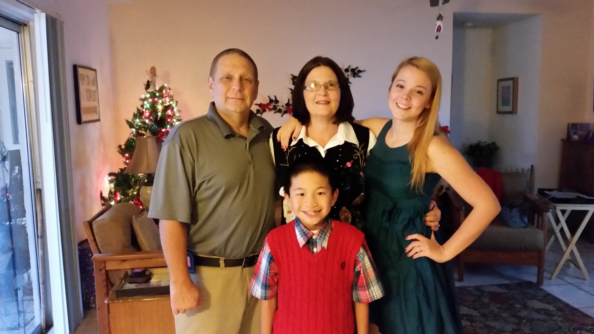 Mitch and Lisa Gray and their son, Jack, are eager to meet the newest member of their family from China. They hope to travel together in the next month to adopt Grant and bring him home. With them is one of their daughters, Rachel.