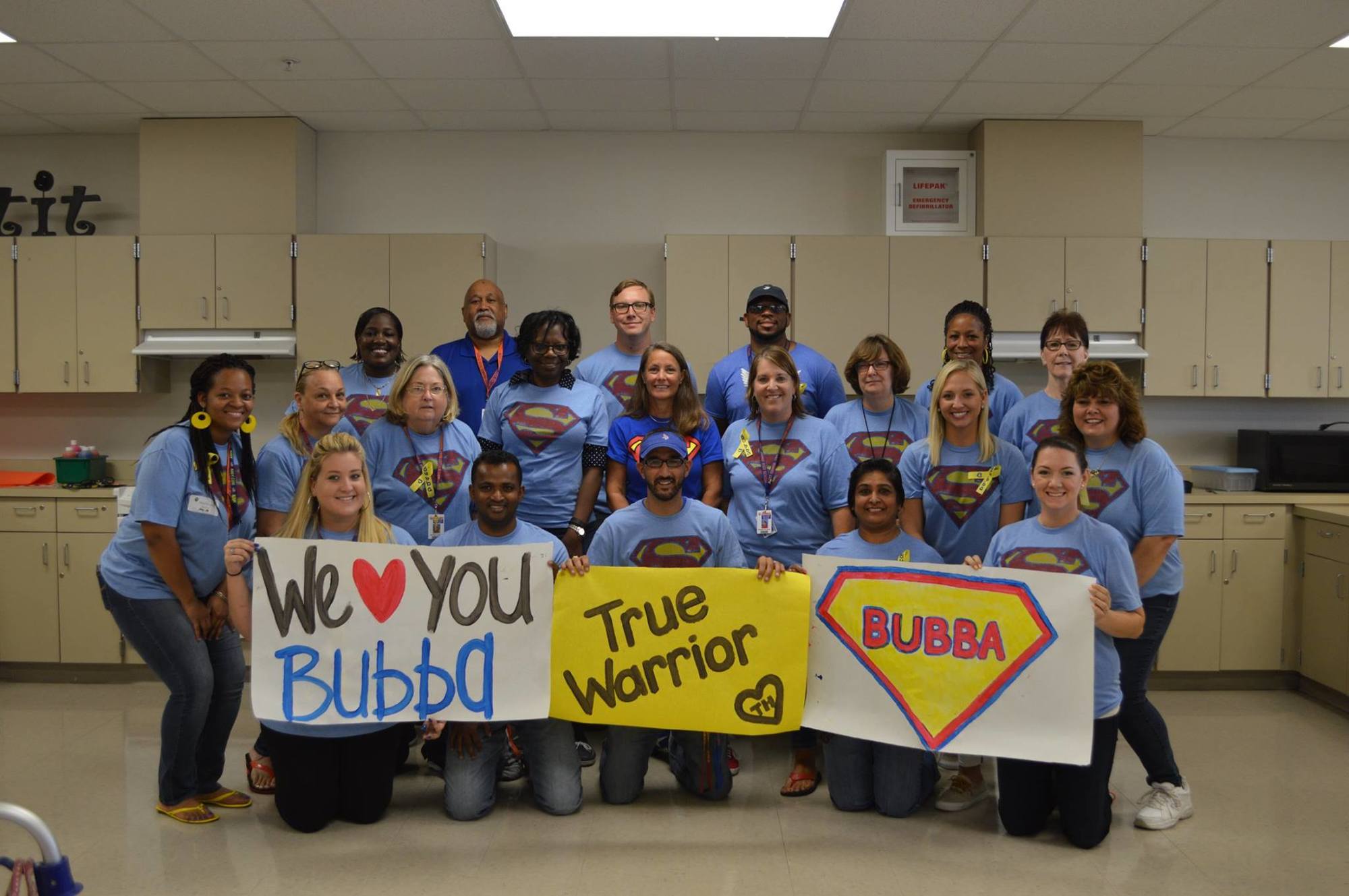 The Exceptional Student Education staff and Principal Doug Szcinski donned blue Superman T-shirts in memory of Travjuan “Bubba” Hunter, who died Aug. 21, 2015, of pneumonia.