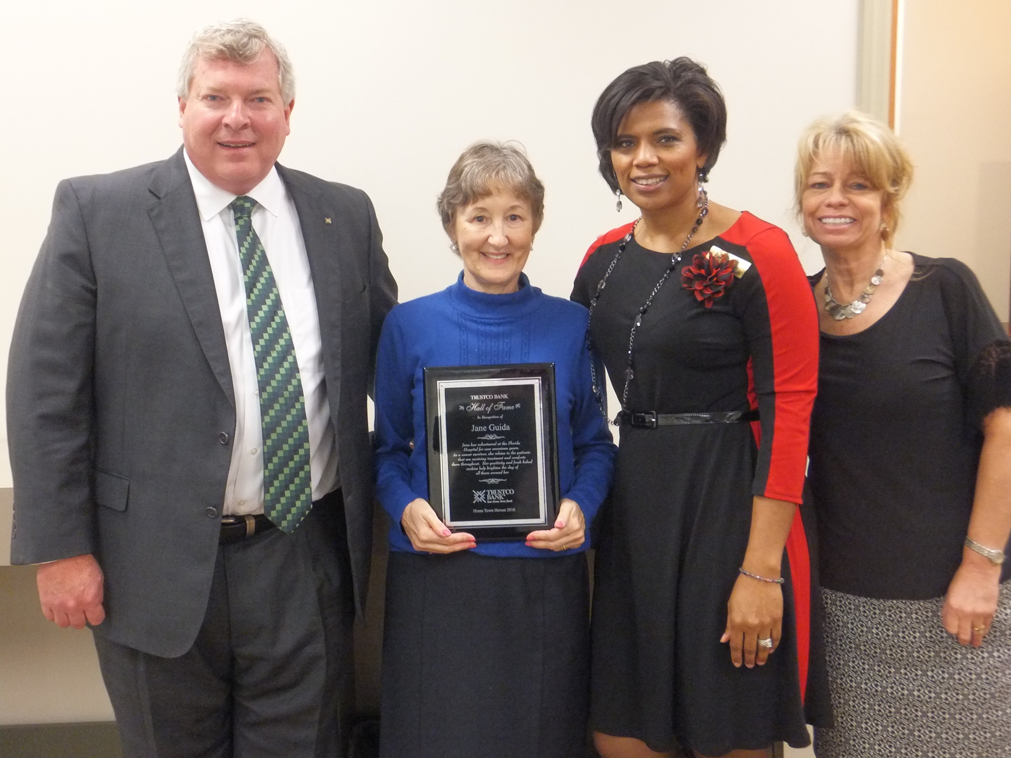 Jane Guida received Trustco Bank's Hometown Hero award in recognition of her service to Orlando Health. Left to right: Eric Schreck, Florida Regional President, Jane Guida, Messerette Newsome and  Shari Bryant.
