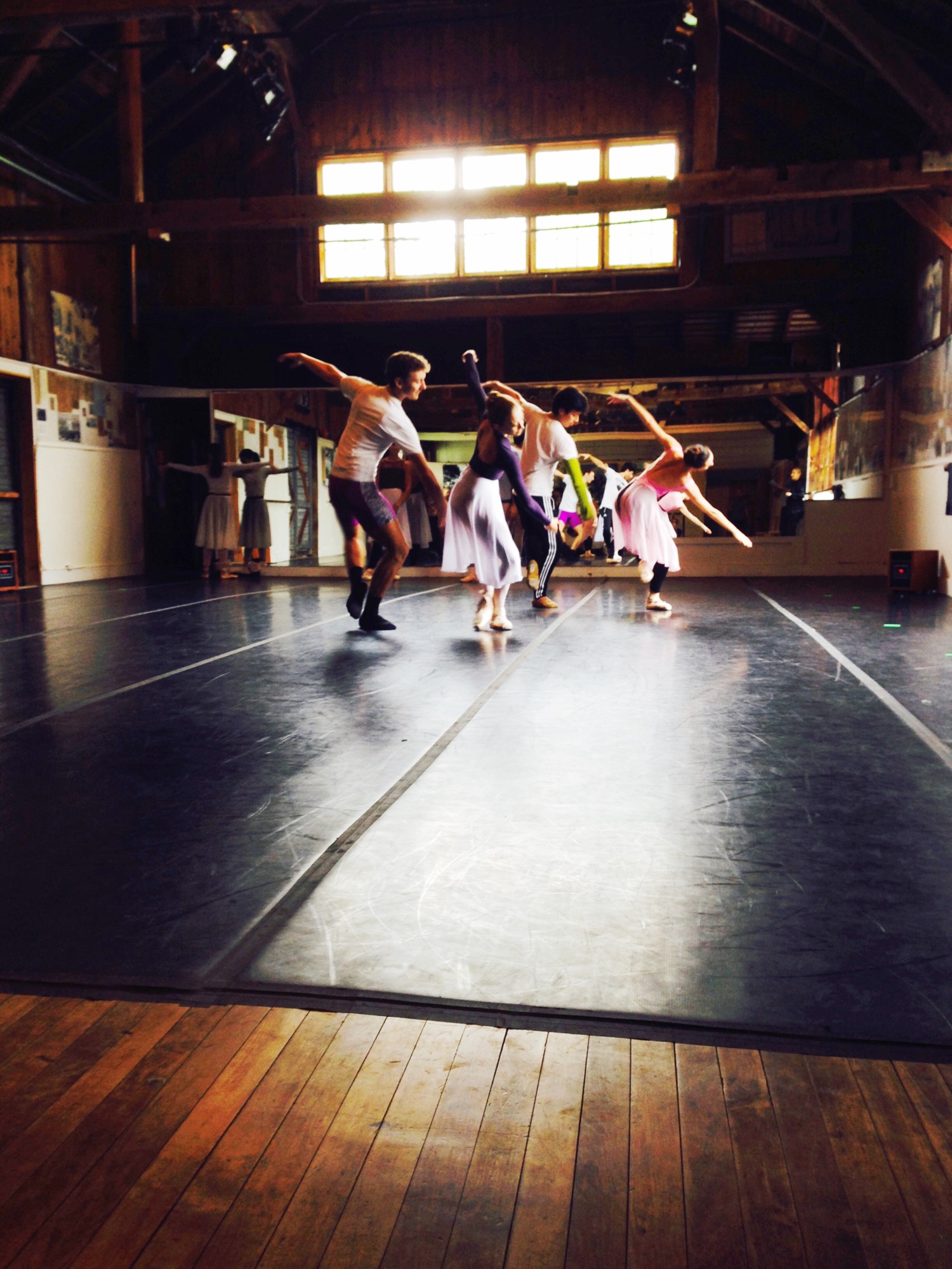 Sarasota Ballet company members rehearsing for their performances at Jacob's Pillow in a rehearsal space converted from an old barn onsite.