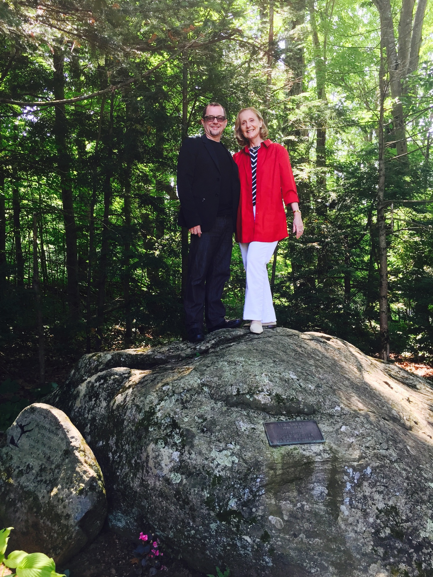 Iain Webb and Margaret Barbieri  on top of the famed Pillow Rock at the Jacob's Pillow Dance Festival in Becket, Mass.