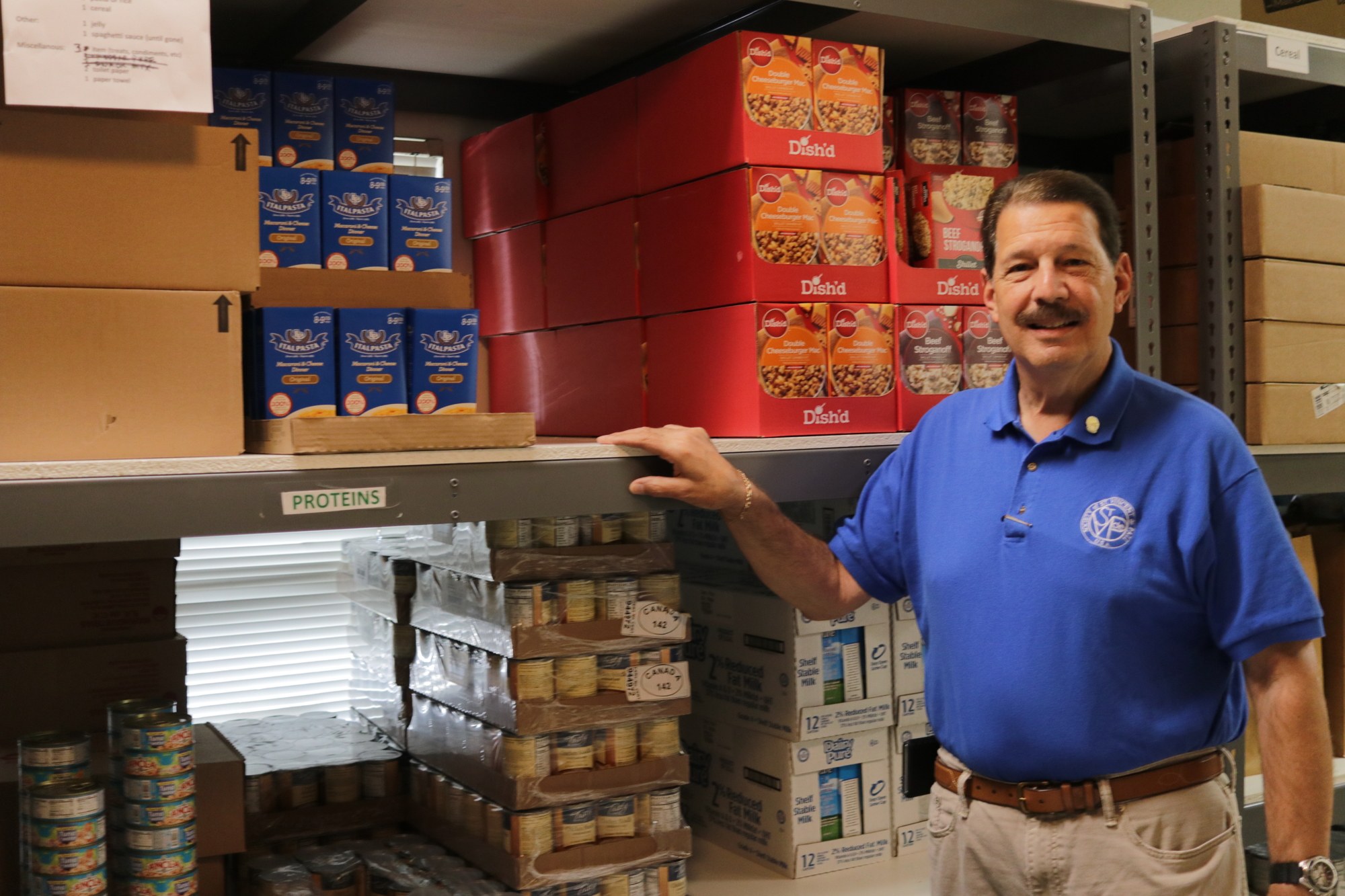 Joe Mazloom is the president of the Society of St. Vincent de Paul at Holy Family Catholic Church. The society provides much-needed services to the poor in Orange County, including distributing food from its food pantry.