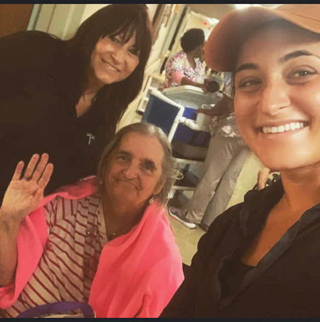 Barbara Gold, left, and her daughter, Elana, visited with Audrey Rausch, a resident at Quality Health Care Center.