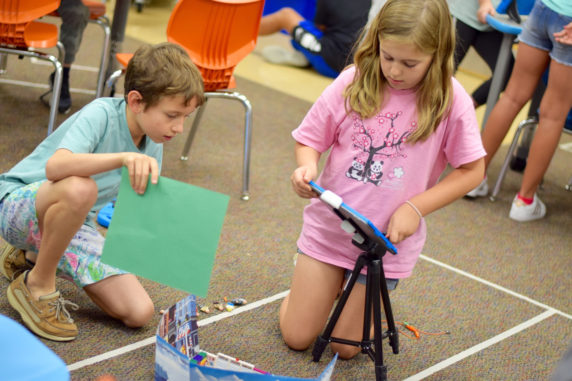 Students in the Stop-Motion Filming Club painstakingly positioned and repositioned Lego pieces, manned their cameras and adjusted lighting for their short films.