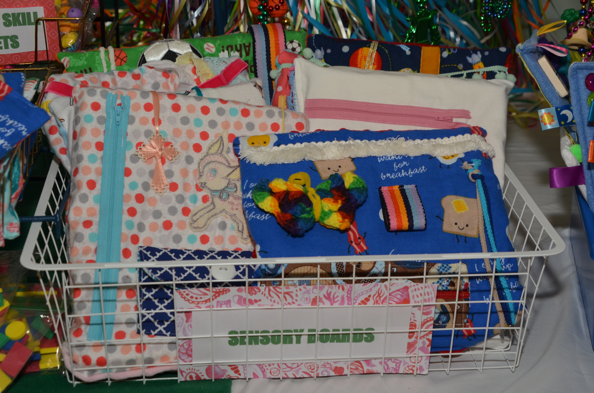 Amber Matlach created for her Girl Scout Gold Award project a collection of sensory boards, beanbags and pillows; marble mazes; I Spy bags; fine-motor skill bracelets; and rainbow rings.