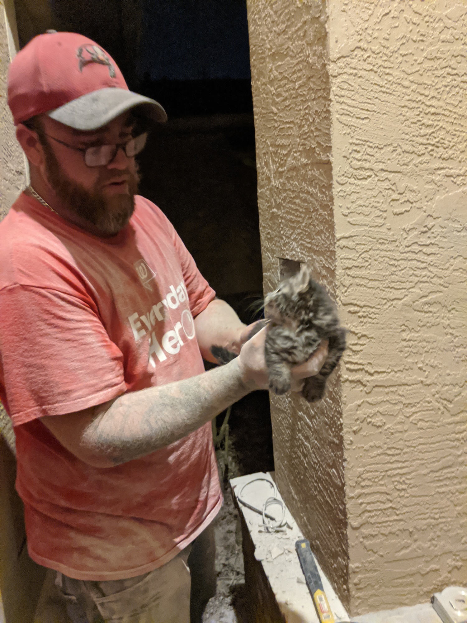 The stunned kitten couldn’t take its eyes off its rescuer, Jake McKenna.