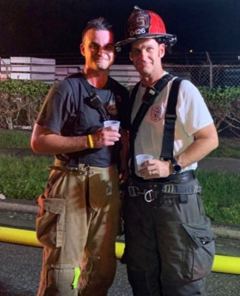 Joe Moy and his son, Christopher, had a rare chance to work side by side when the Ocoee and Winter Garden departments were called to fight a fire.