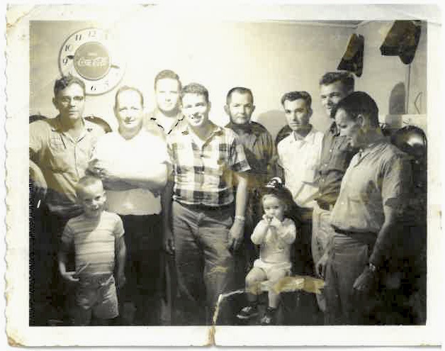 Chief Peters, second from left, and firefighters at the W.G. station around 1963: Wilson Hall, left, William Peters Ungaro, Cotton Lucas, Jimmy Powell, Ardell Homes, Cooter Creech, Stewart Baker; in front, sons Fred and Glenn.