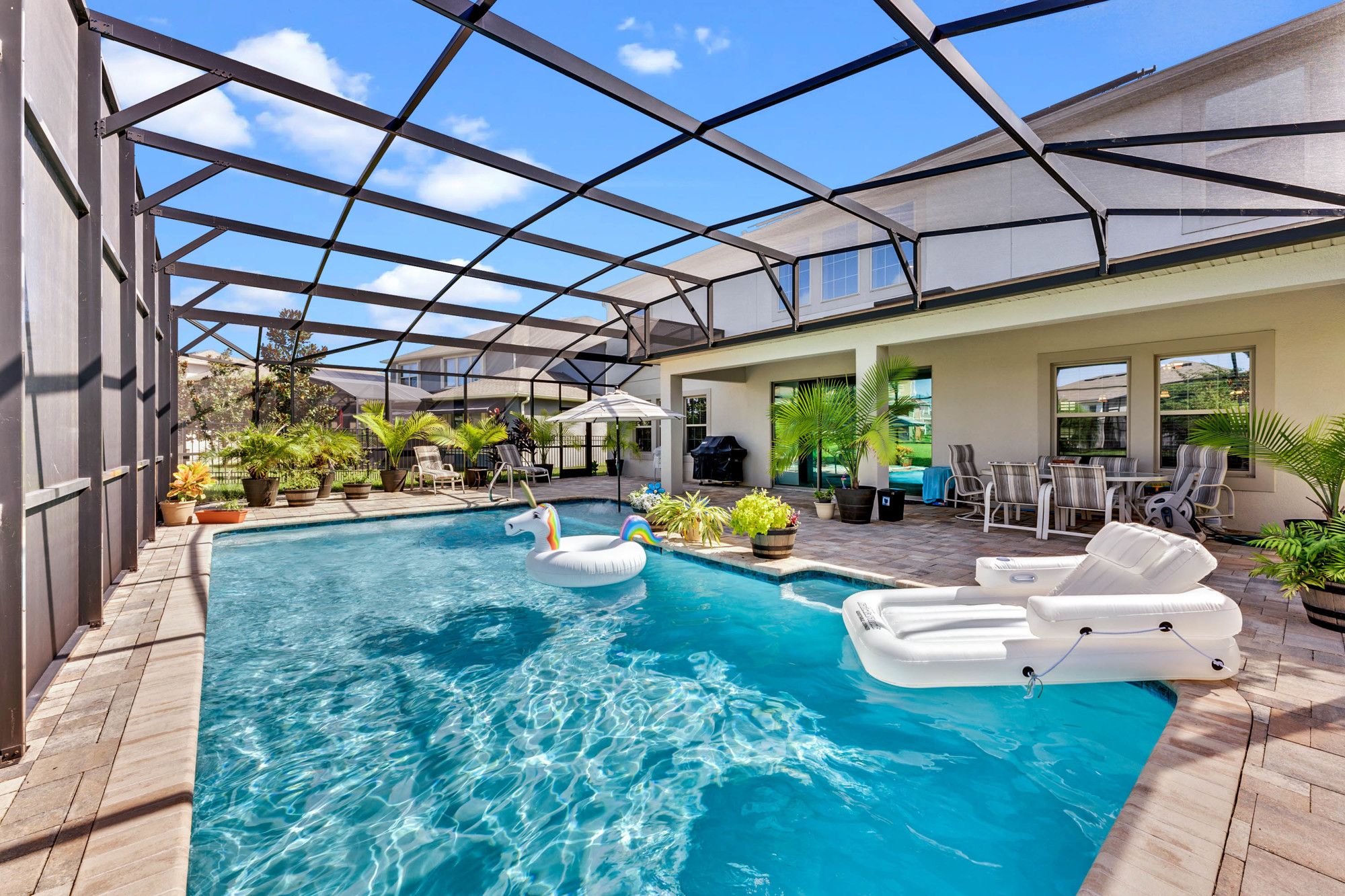 This 4,290-square-foot home at 13924 Jomatt Loop, Winter Garden, was listed Sept. 10, for $589,900. It has four bedrooms, three-and-one-half baths and a pool. (Photo by DeVore Design for Clock Tower Realty)