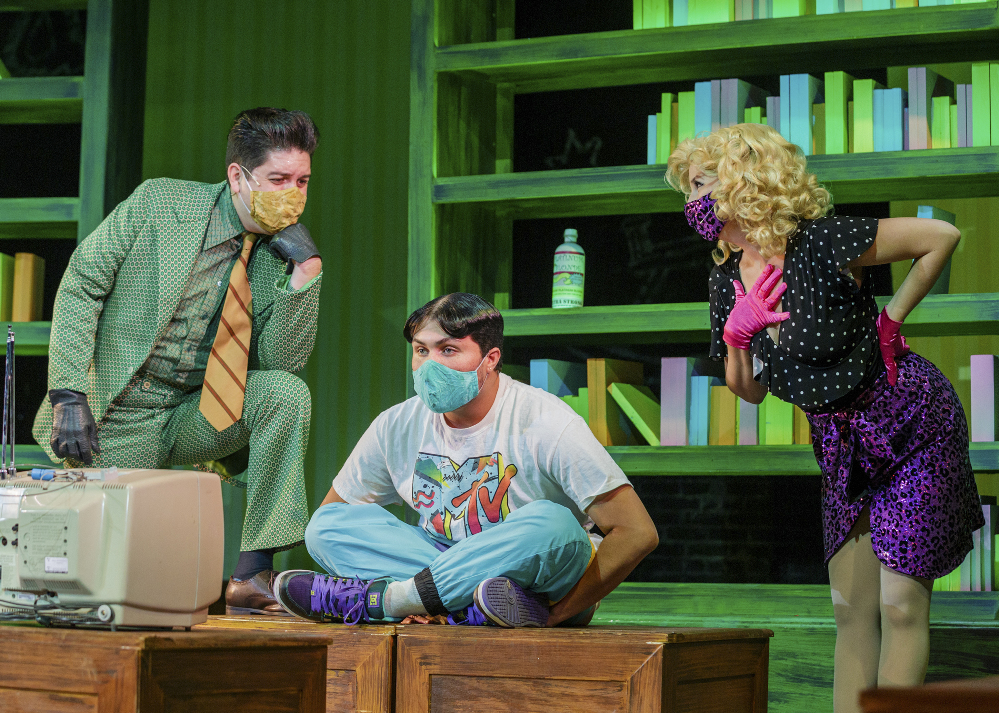 Mr. and Mrs. Wormwood — played by Daniel Abels Rodriguez and Hannah McGinley Lemasters — talk to their son, Michael, played by Yan Diaz. (Courtesy Steven Miller Photography)