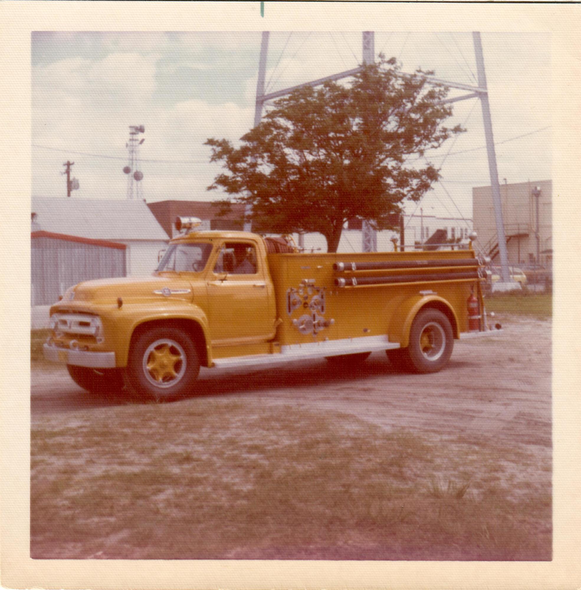The American La France fire engine originally was red but later received a bright yellow coat of paint.