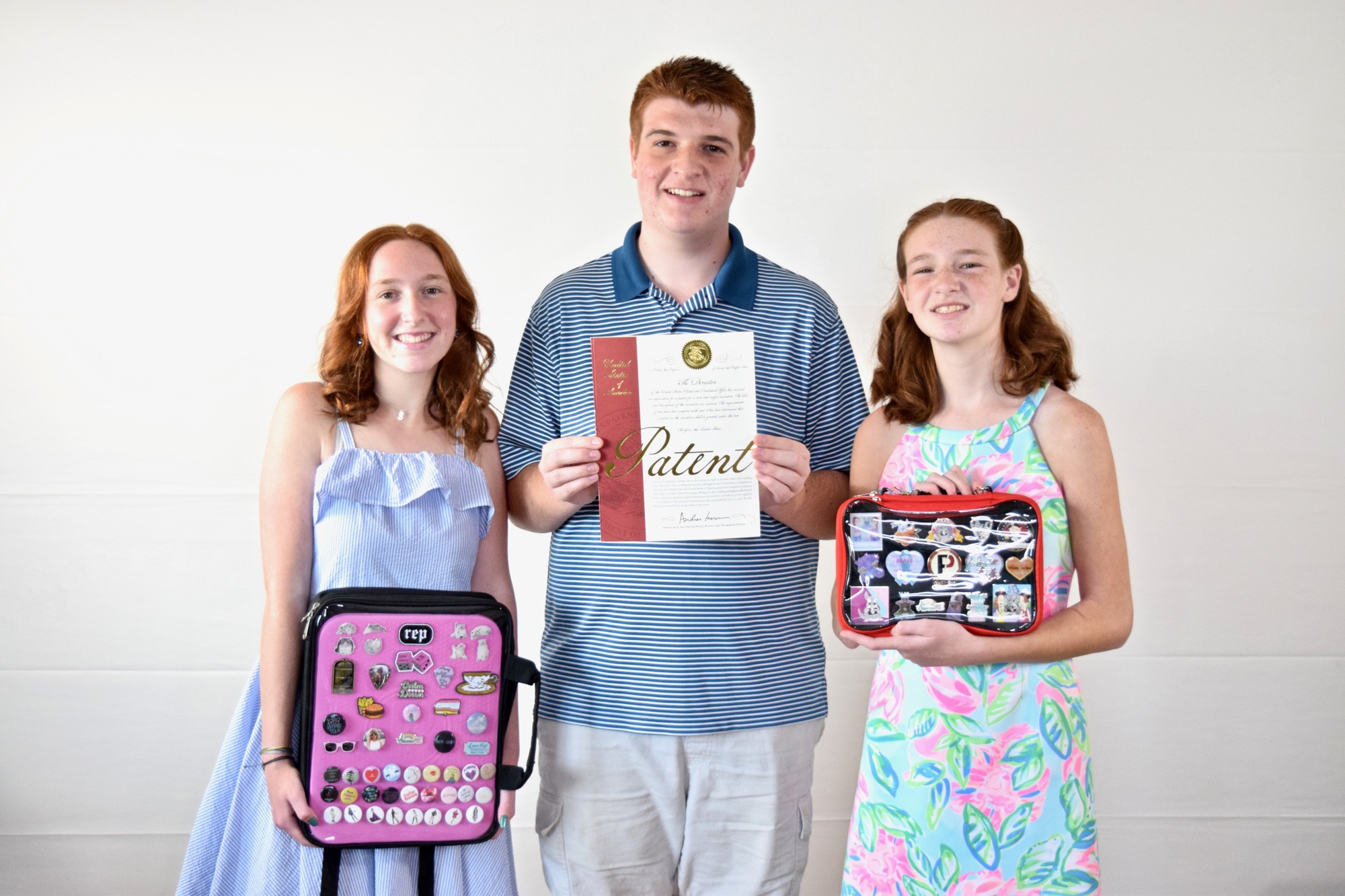 Sydney, Alex and Julia Hevier recently received their patent for the PinFolio.