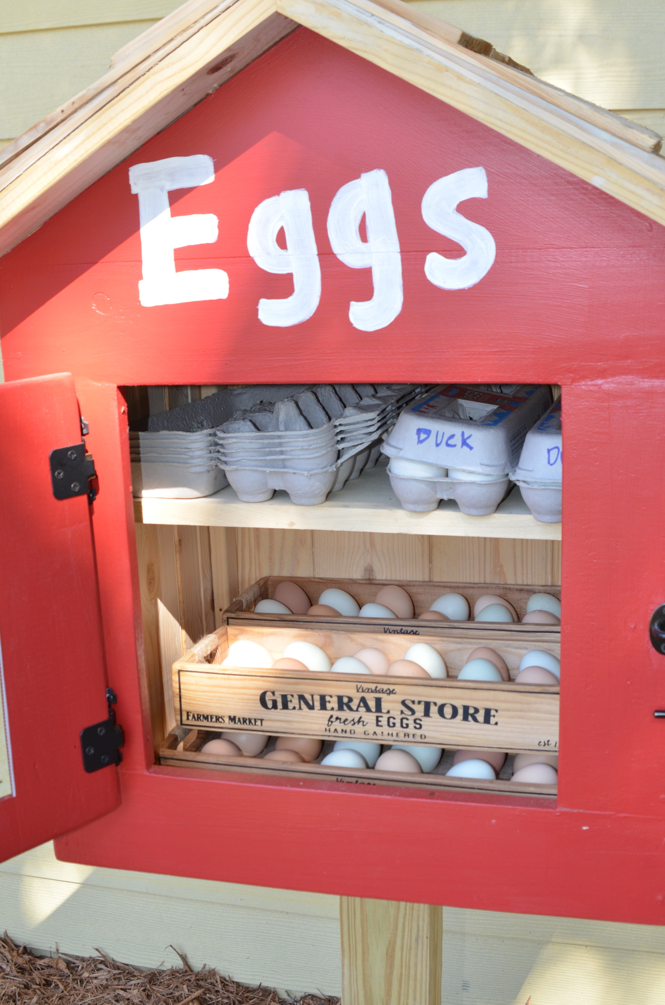 Tristan Milliken sells his eggs in an honor box in front of his home in Oakland.